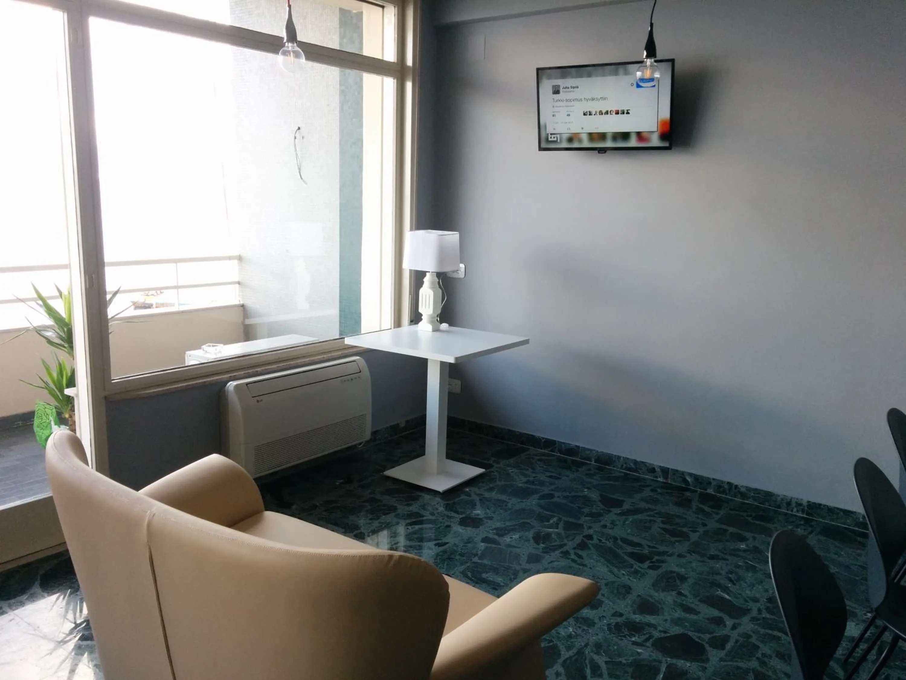 Communal lounge/ TV room in Ciauru Design B&B