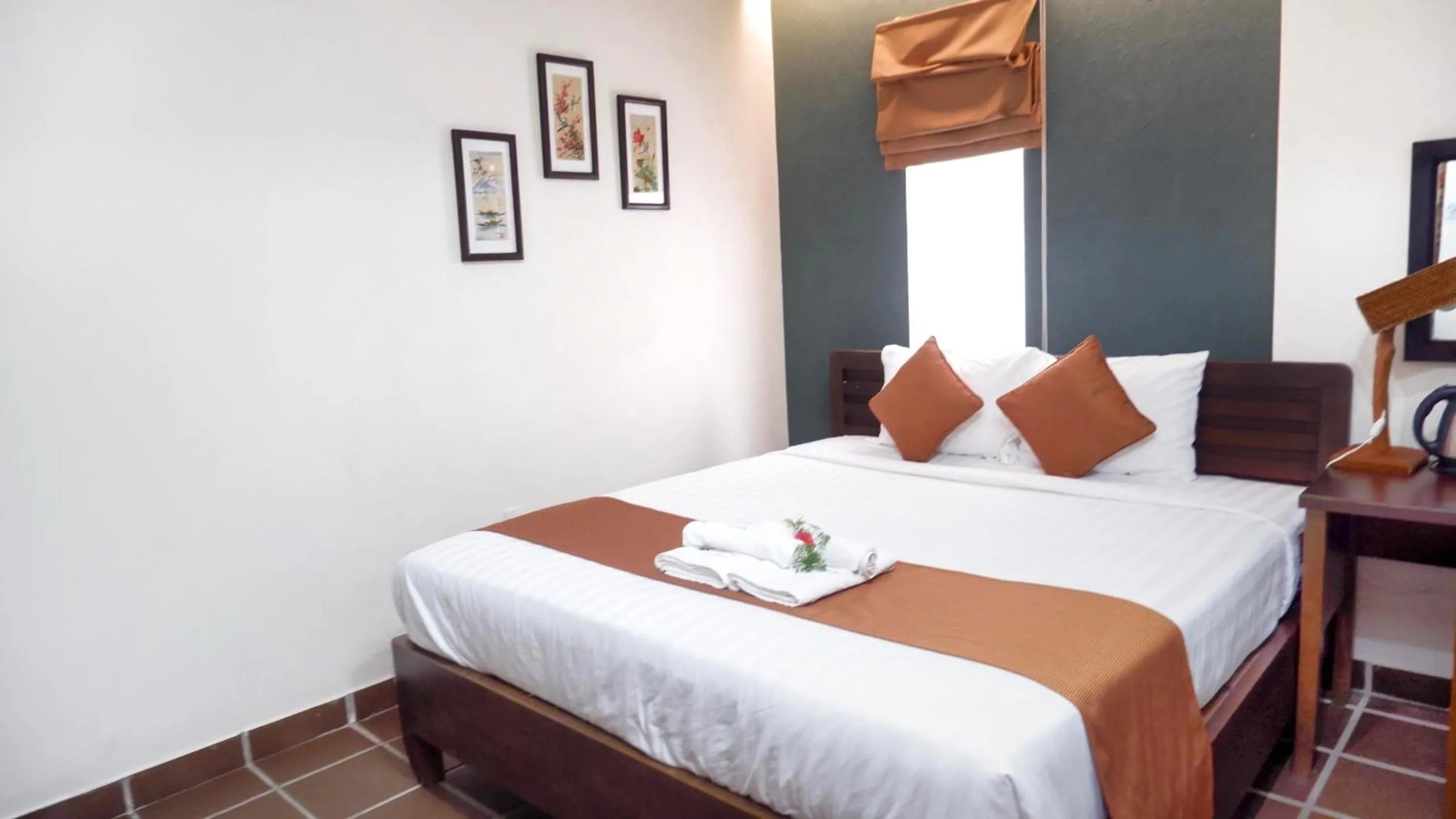 Bed in Ananas Family Hotel