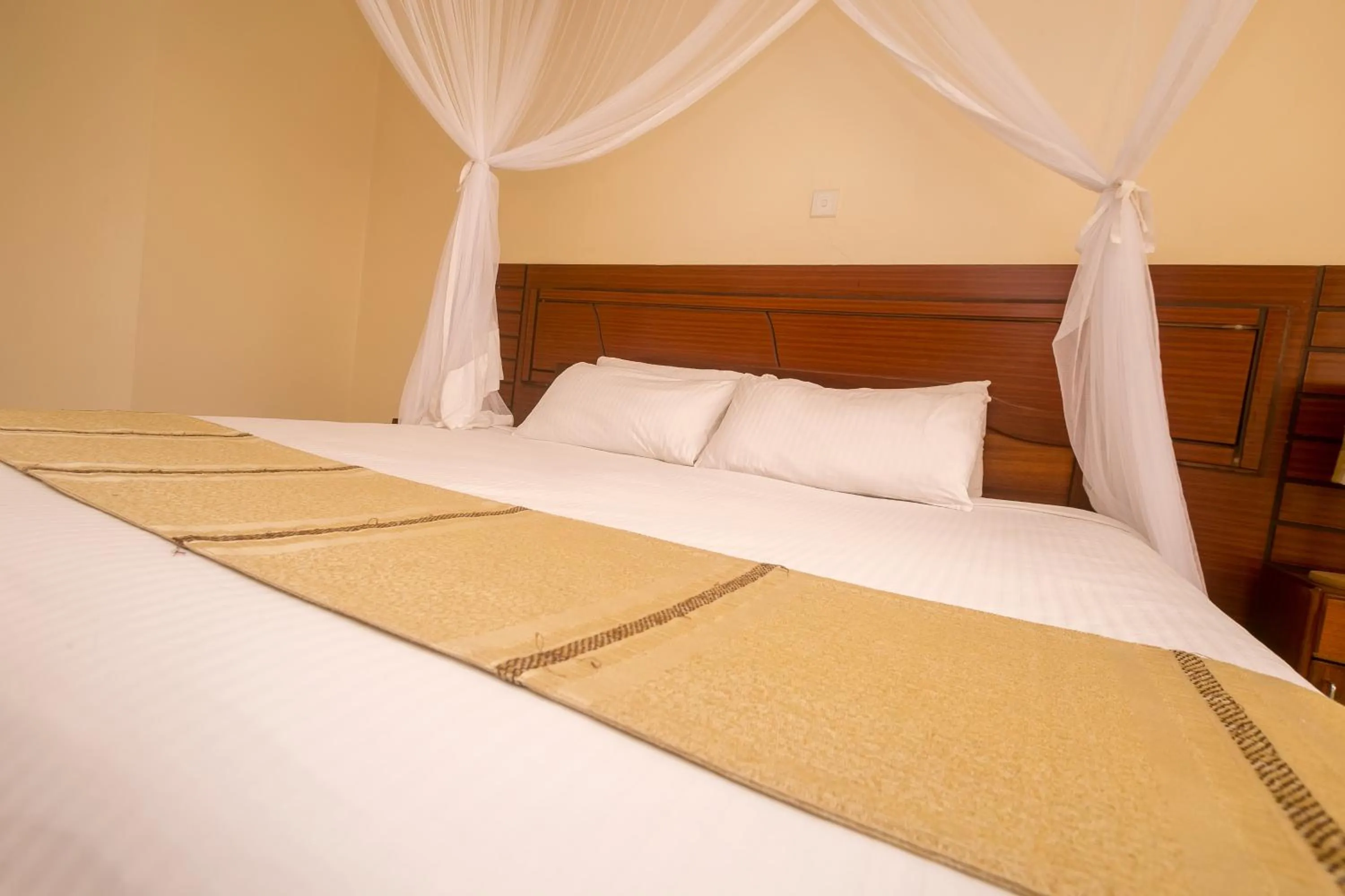 Bed in Corat Africa Hotel