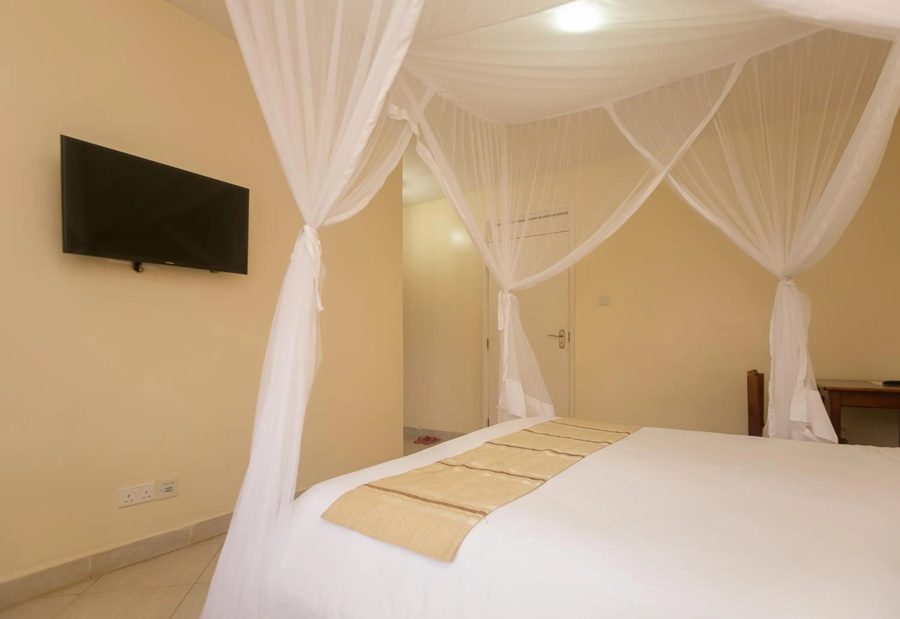Bed in Corat Africa Hotel
