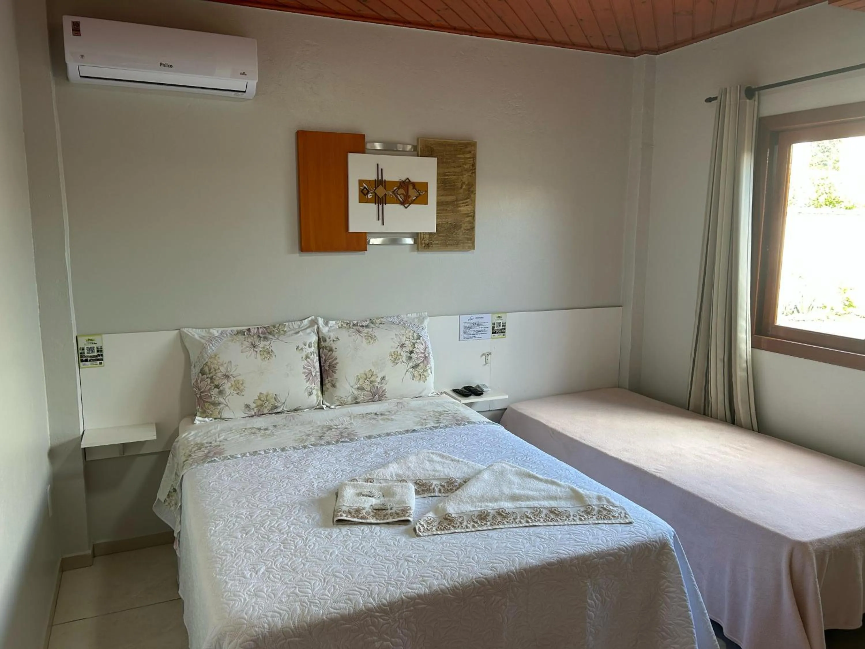 Bed in Pousada Angela