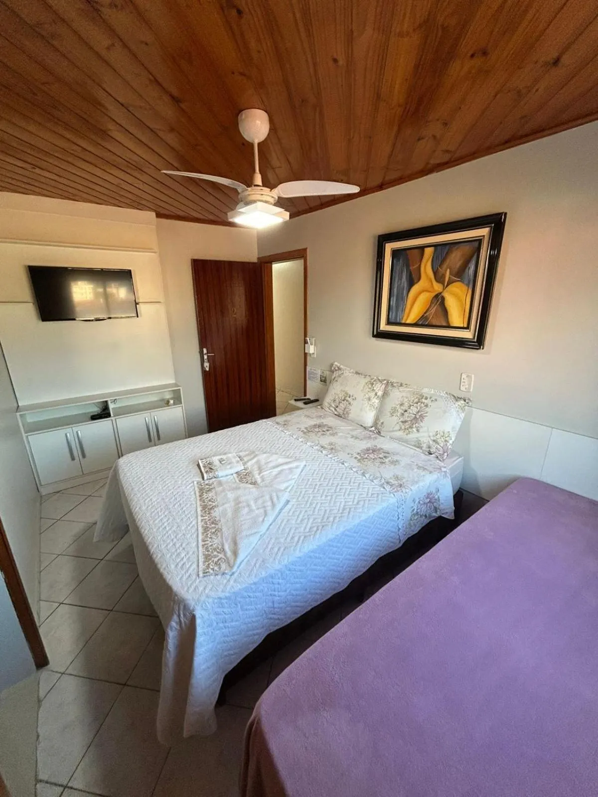 Bed in Pousada Angela