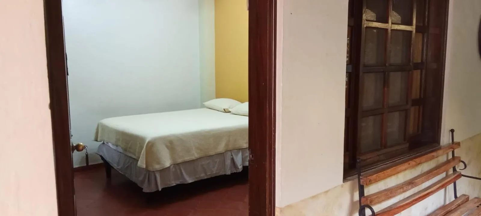 Bed in Hotel Acropolis Maya