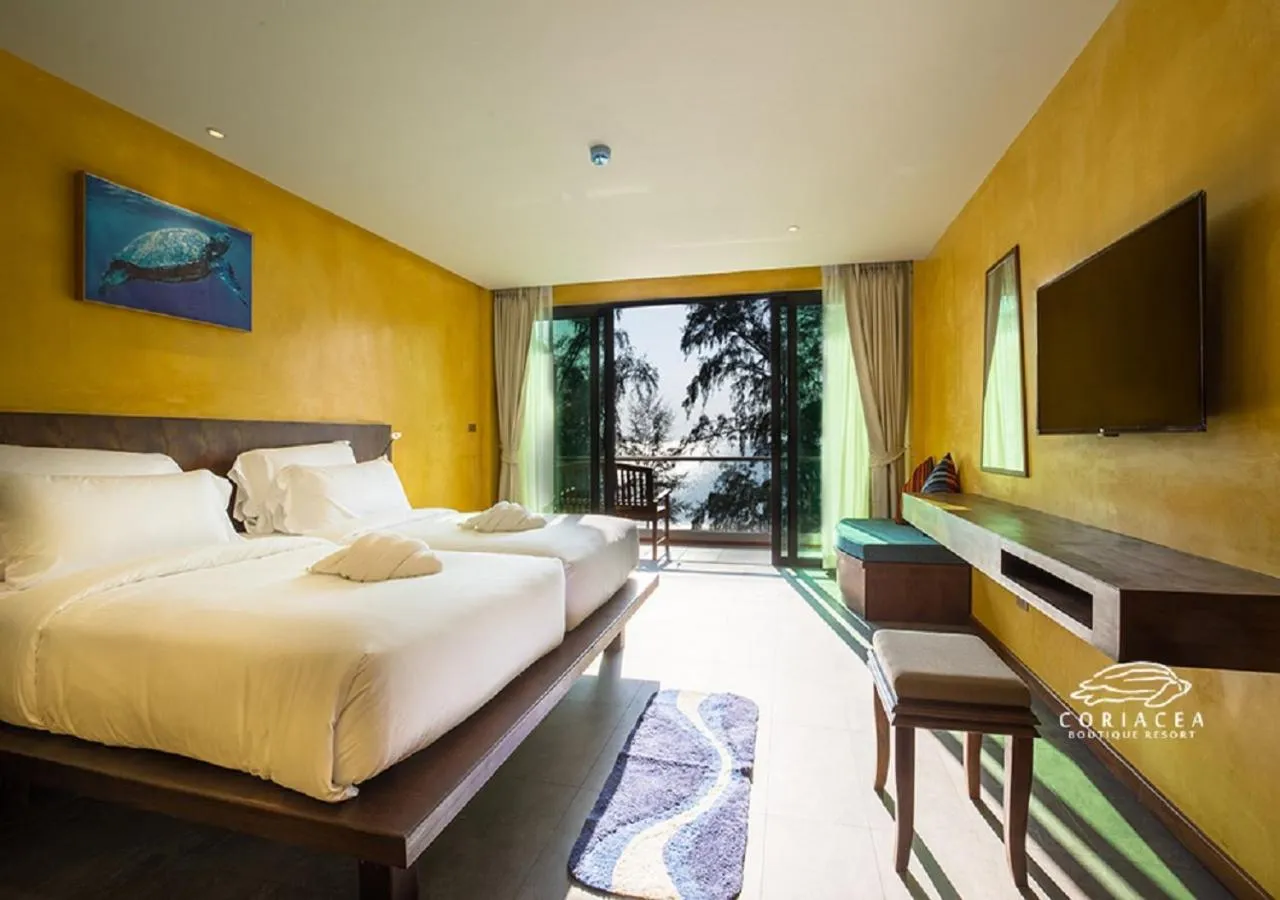TV and multimedia, Bed in Coriacea Beachfront Boutique Phuket Resort