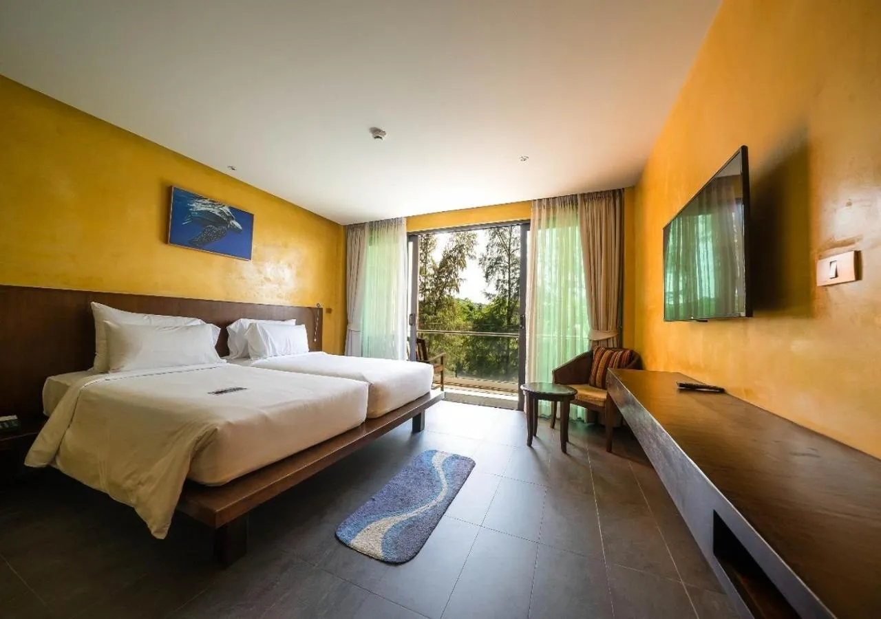 Photo of the whole room, Bed in Coriacea Beachfront Boutique Phuket Resort