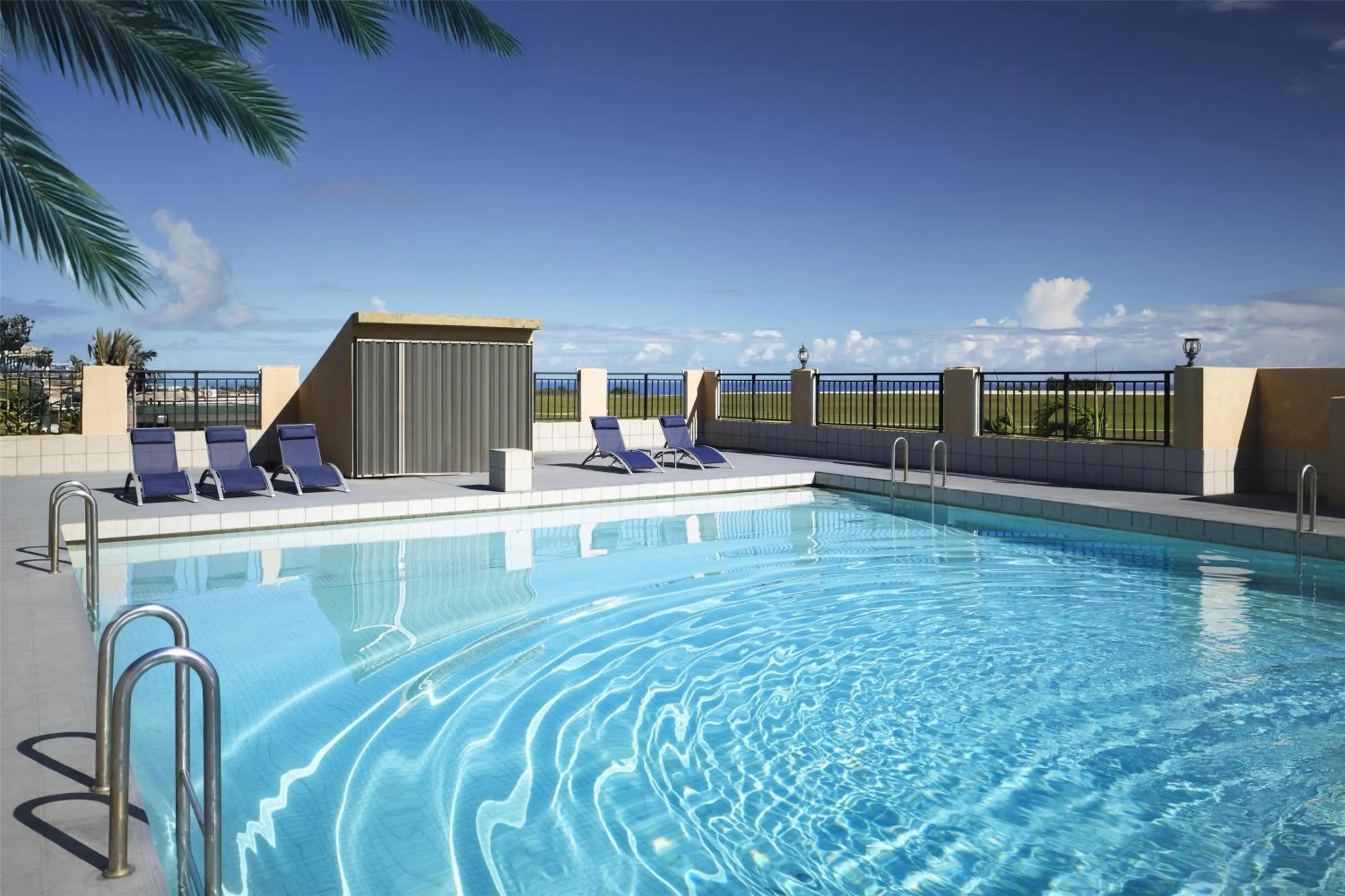 Pool view in SureStay by Best Western Guam Airport