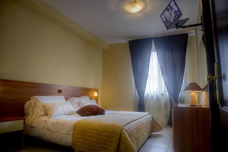 Bed in Hotel Tuscania Panoramico