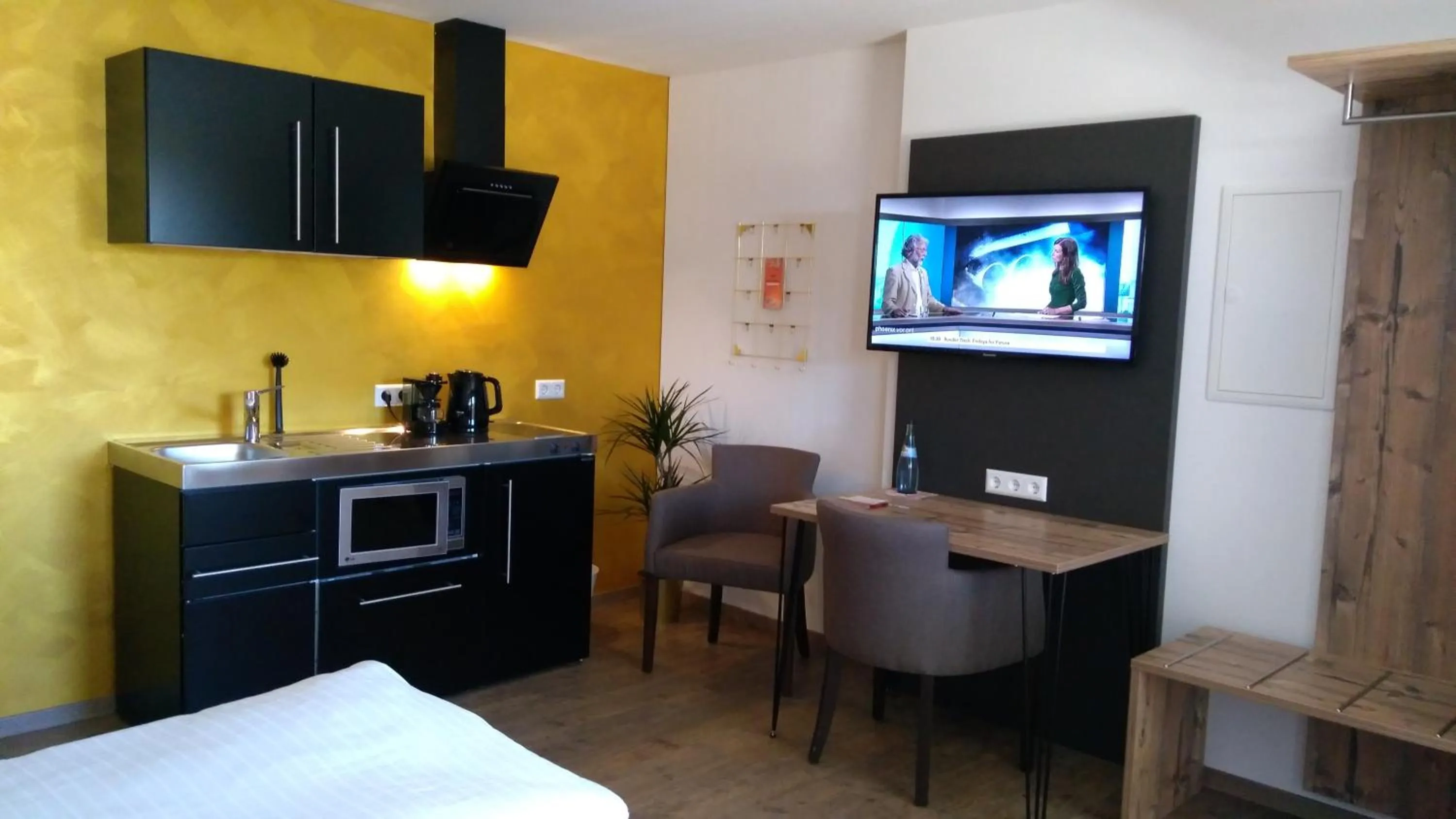 Photo of the whole room, Bed in Brigel-Hof