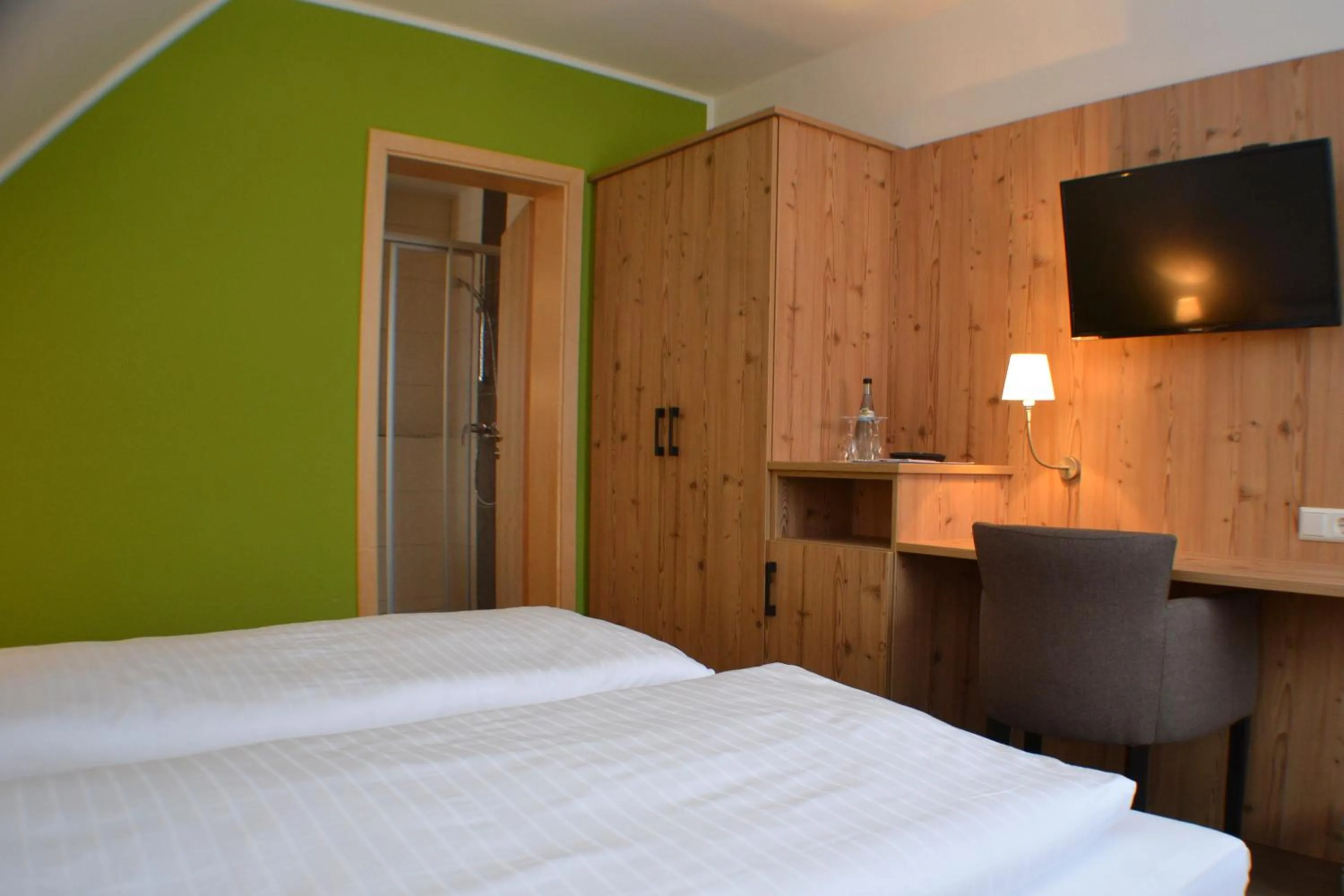 Photo of the whole room, Bed in Brigel-Hof