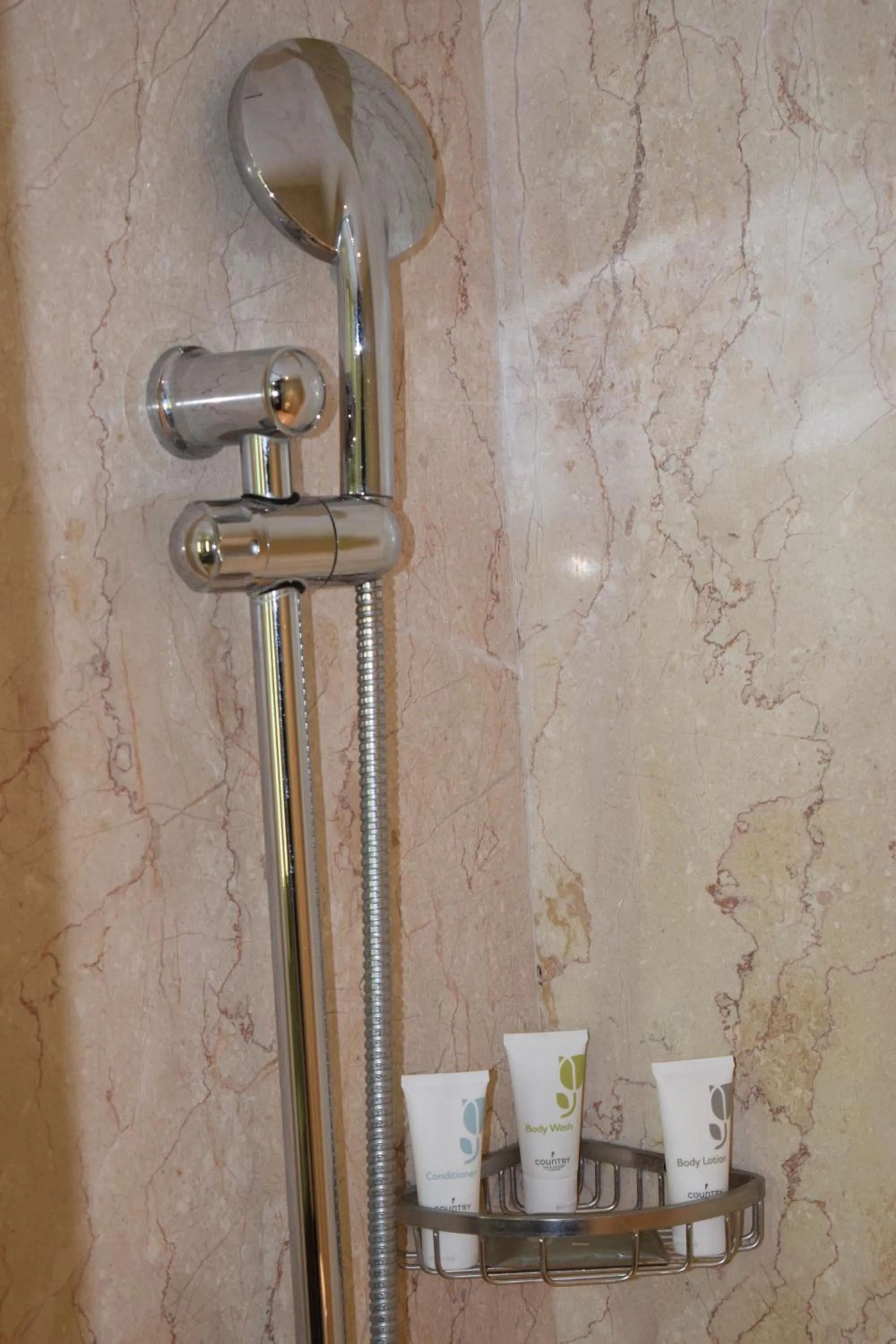 Shower in Country Inns & Suites By Radisson Manipal