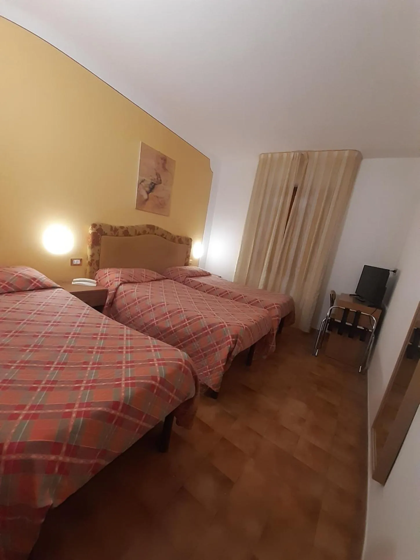 Bed in Hotel Ambrogini