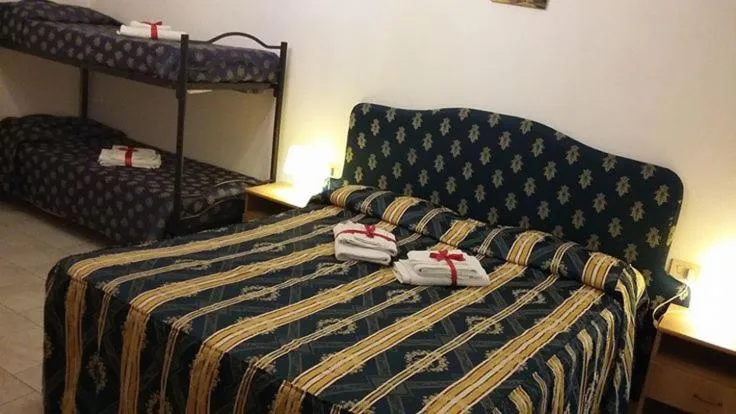 Bedroom in Hotel Ambrogini