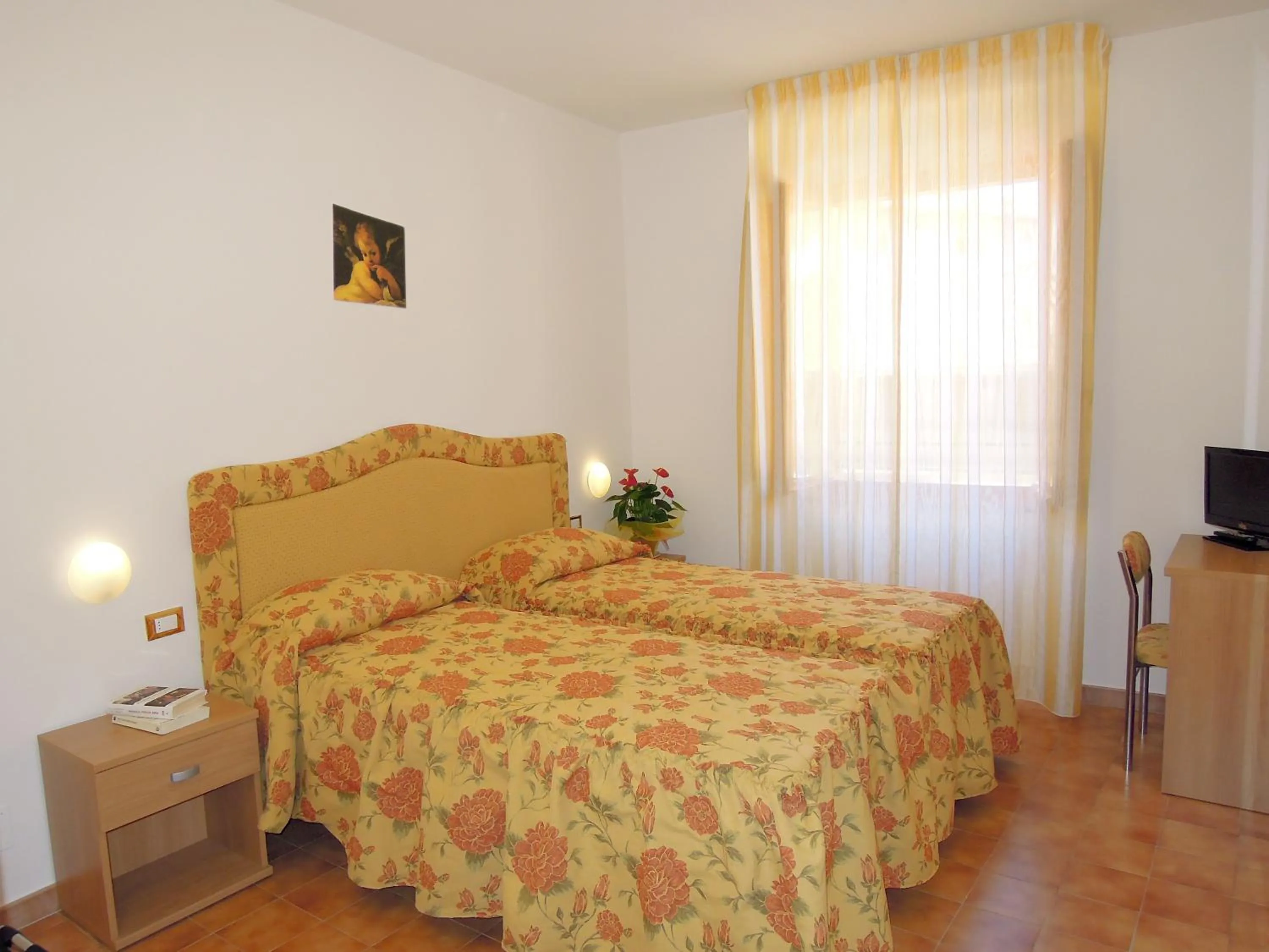 Bedroom in Hotel Ambrogini