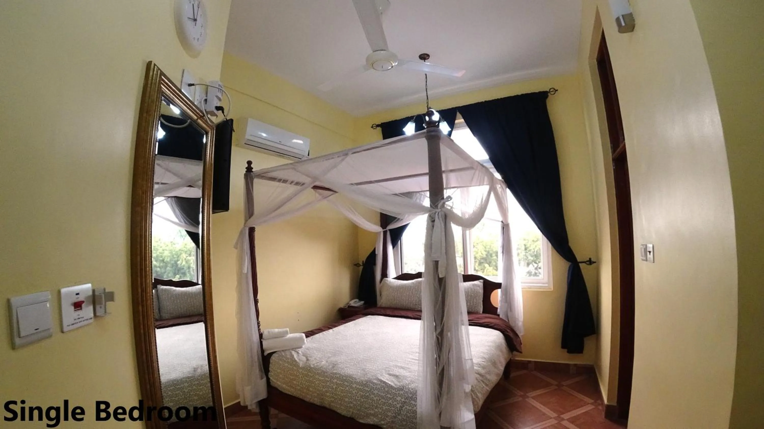 Photo of the whole room, Bed in East Point Hotel Moshi