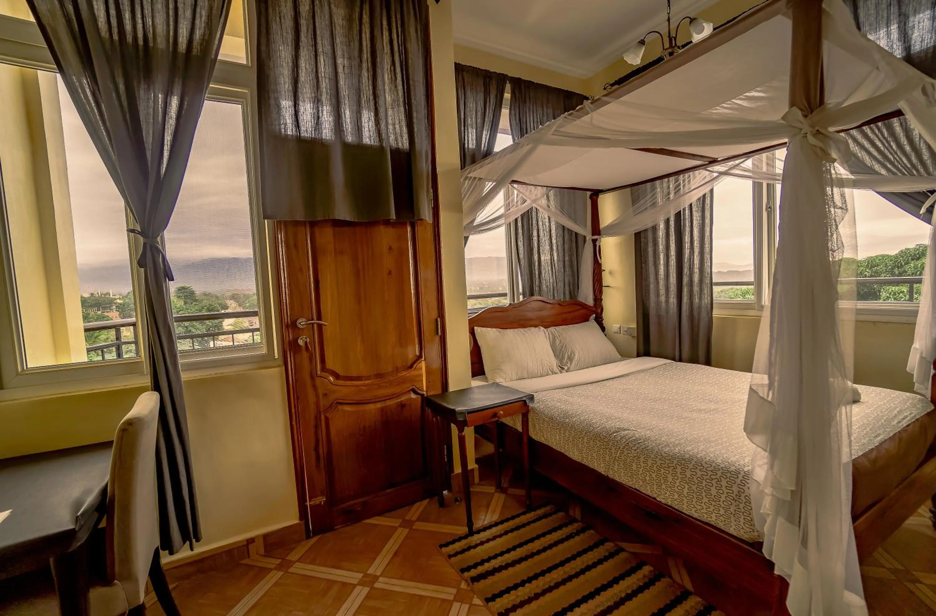 Bed in East Point Hotel Moshi