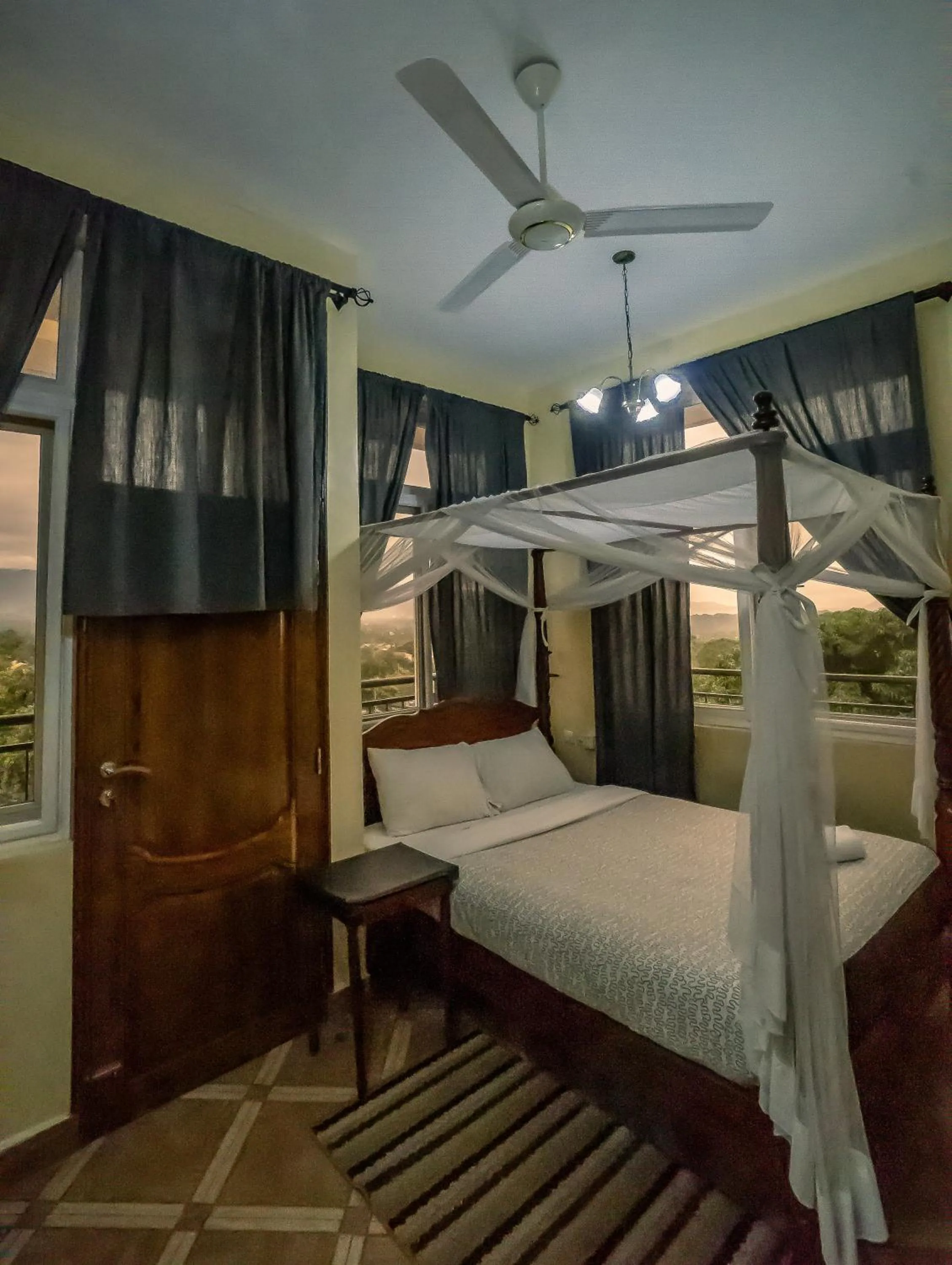 Bed in East Point Hotel Moshi