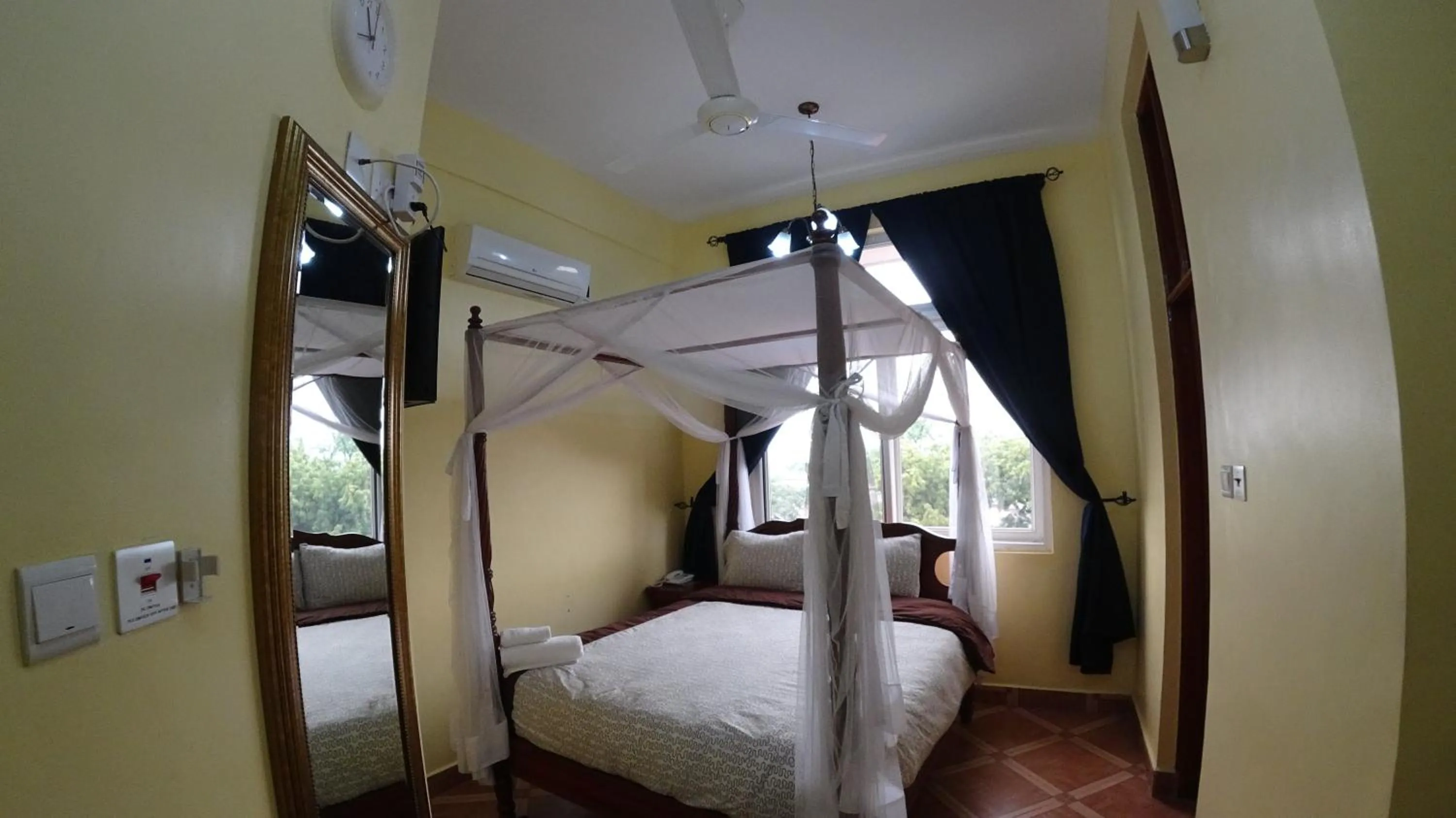 Bed in East Point Hotel Moshi