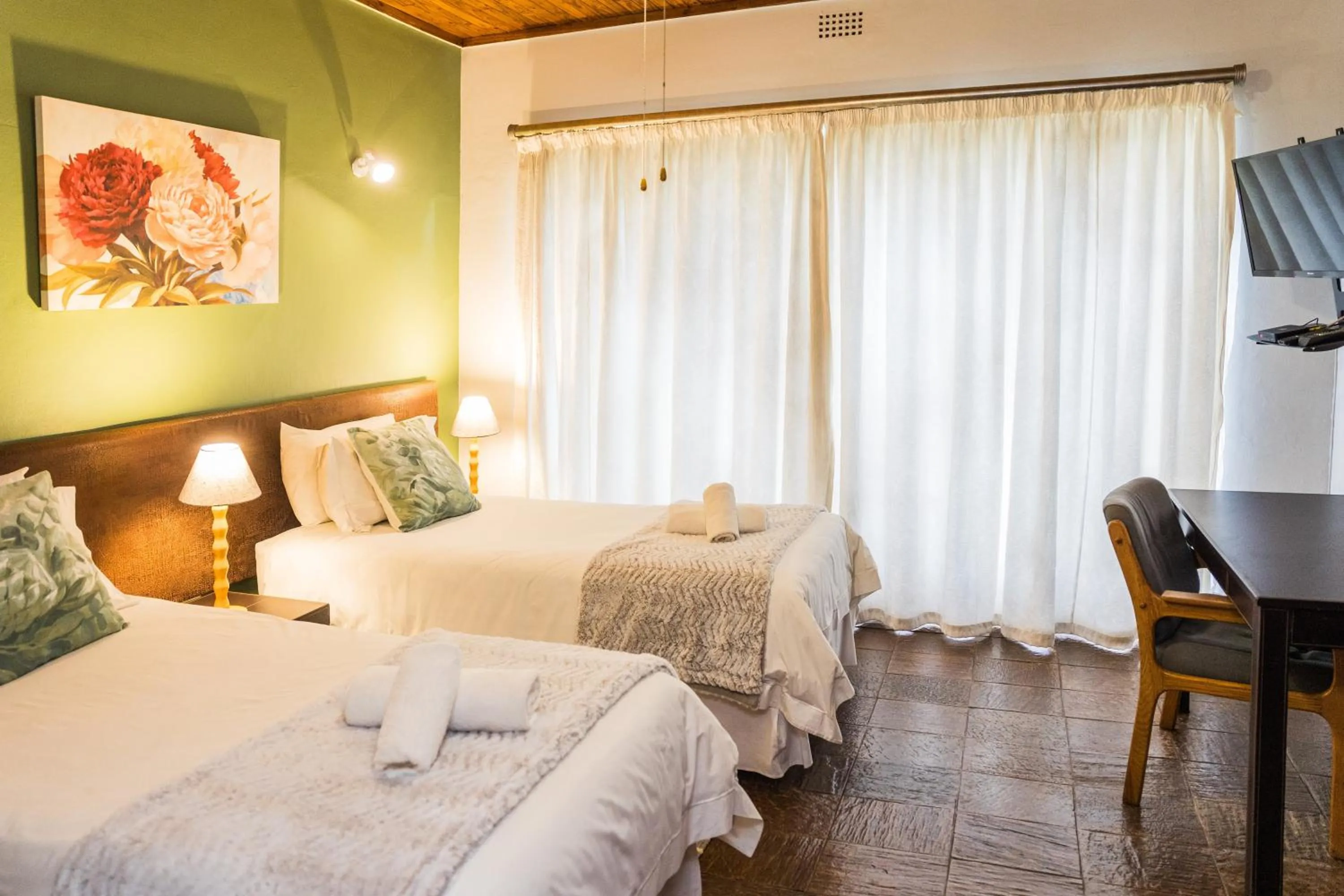 Bed in Rozendal Guest House