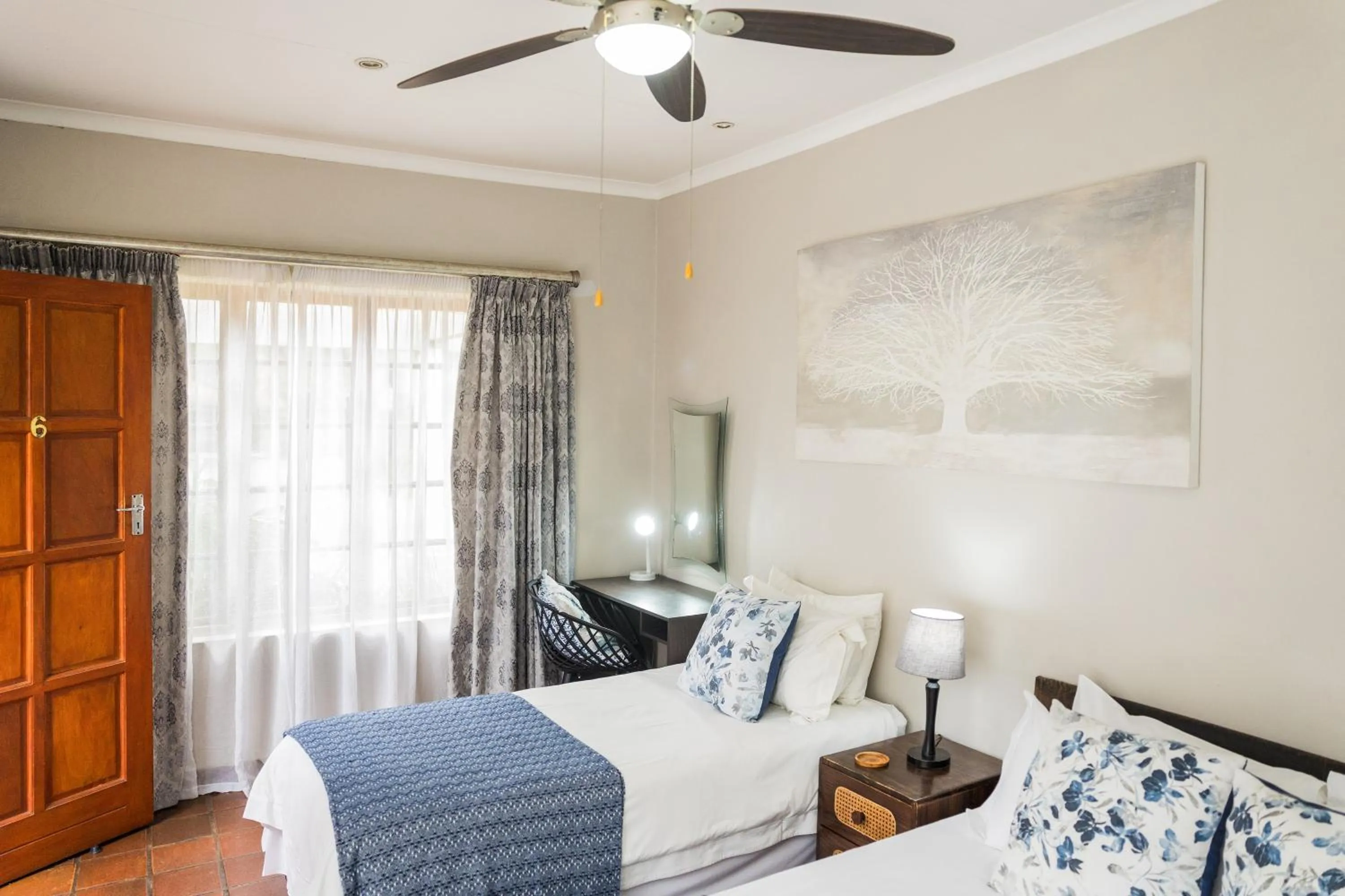 Bed in Rozendal Guest House