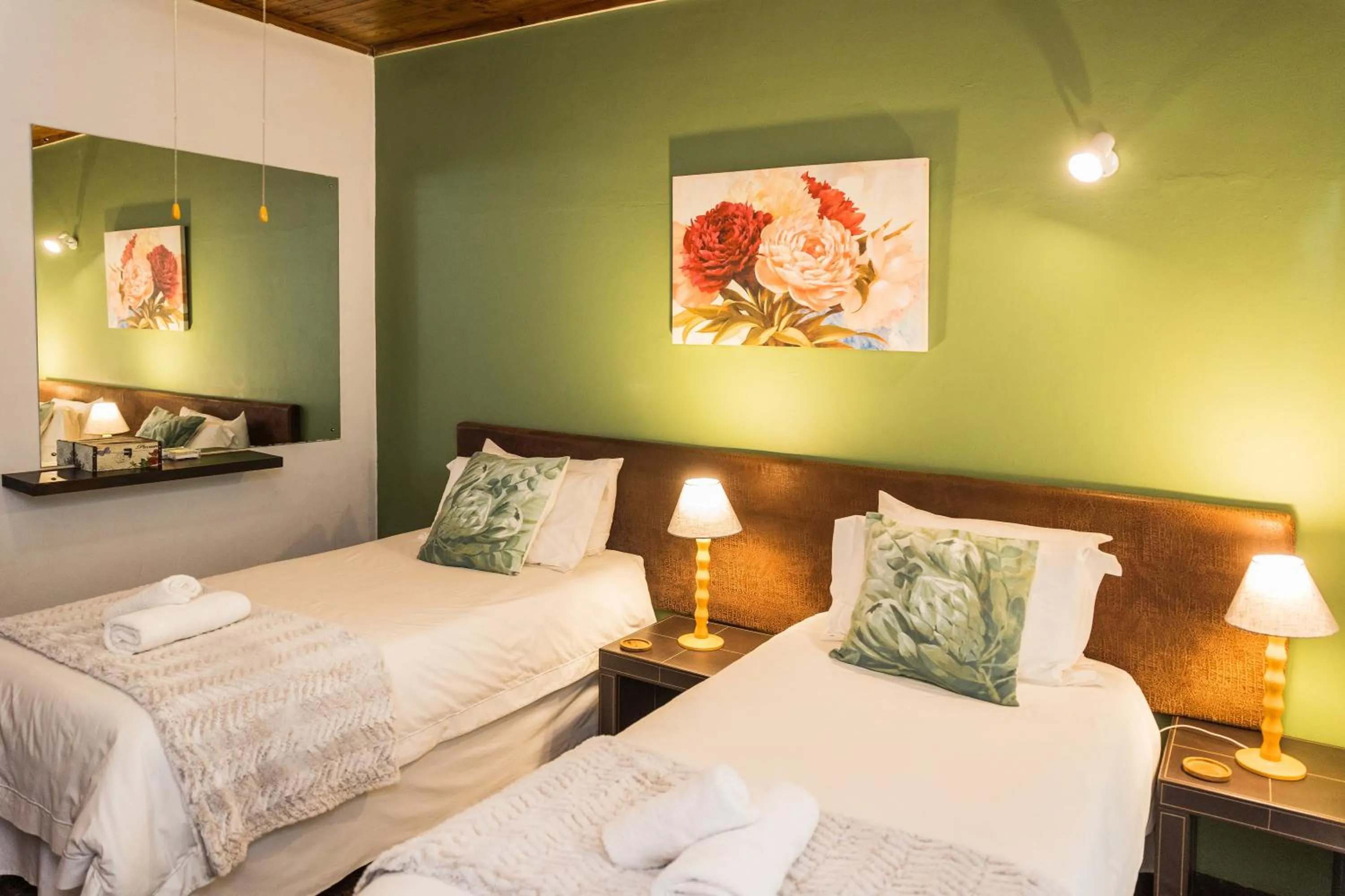 Bed in Rozendal Guest House