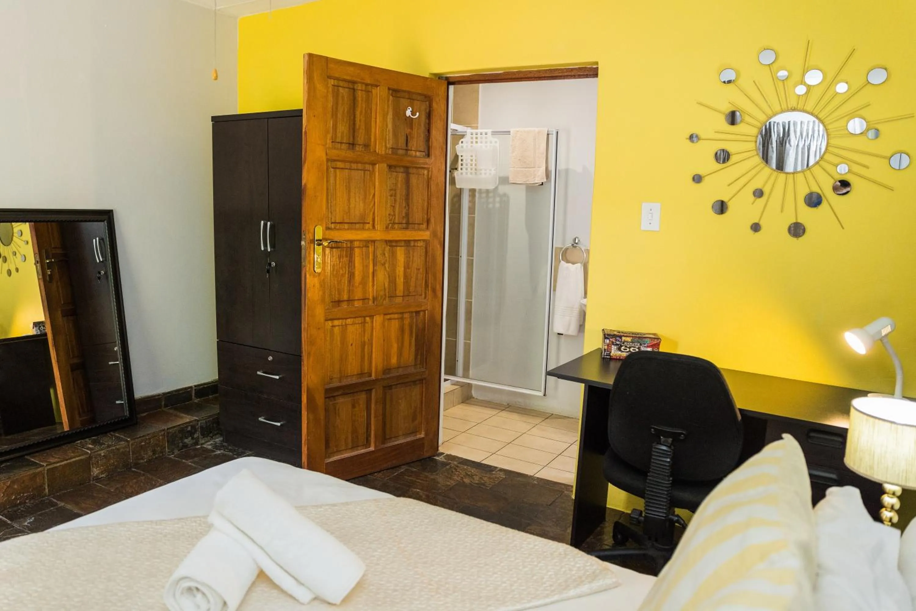 Bed in Rozendal Guest House