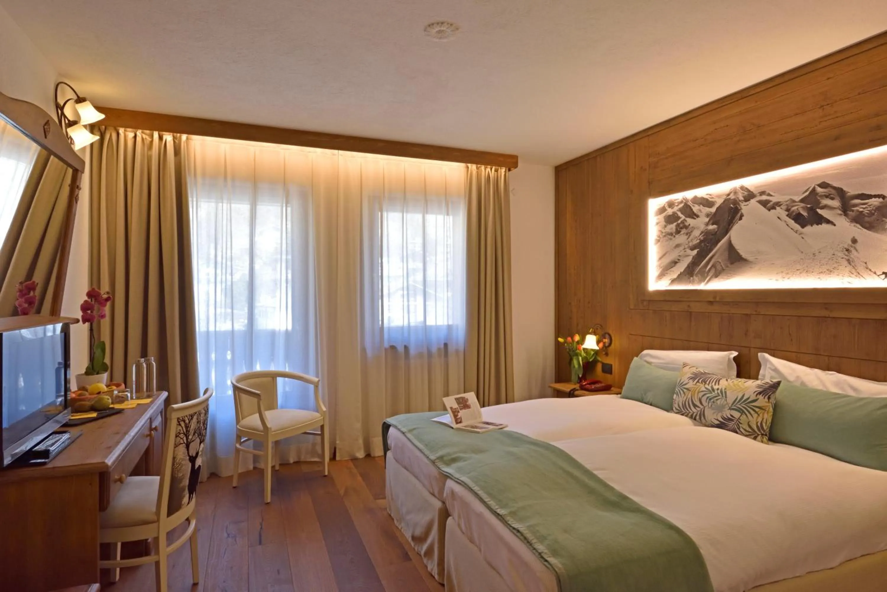 Bed in Hotel Beau Sejour