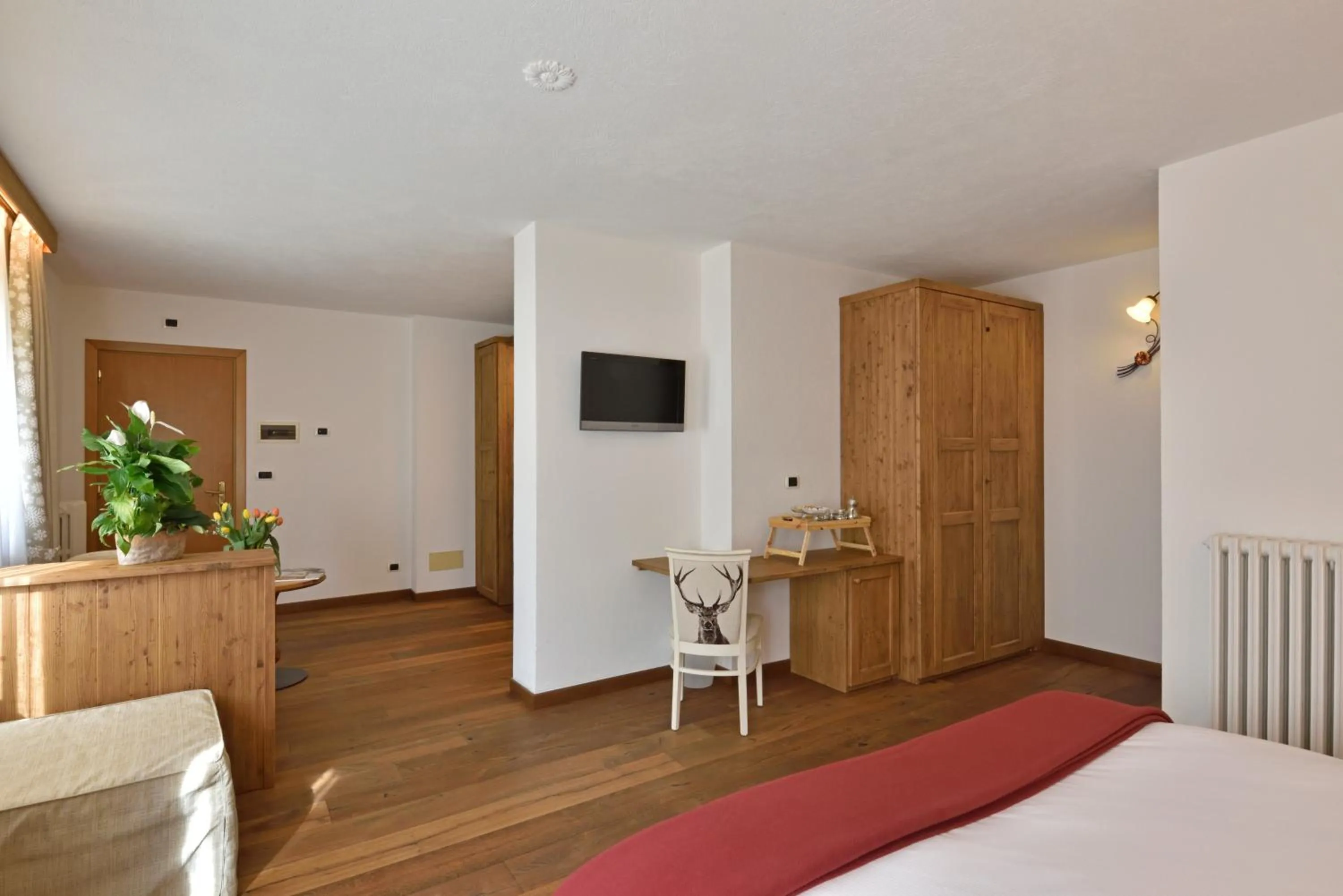 Bed in Hotel Beau Sejour