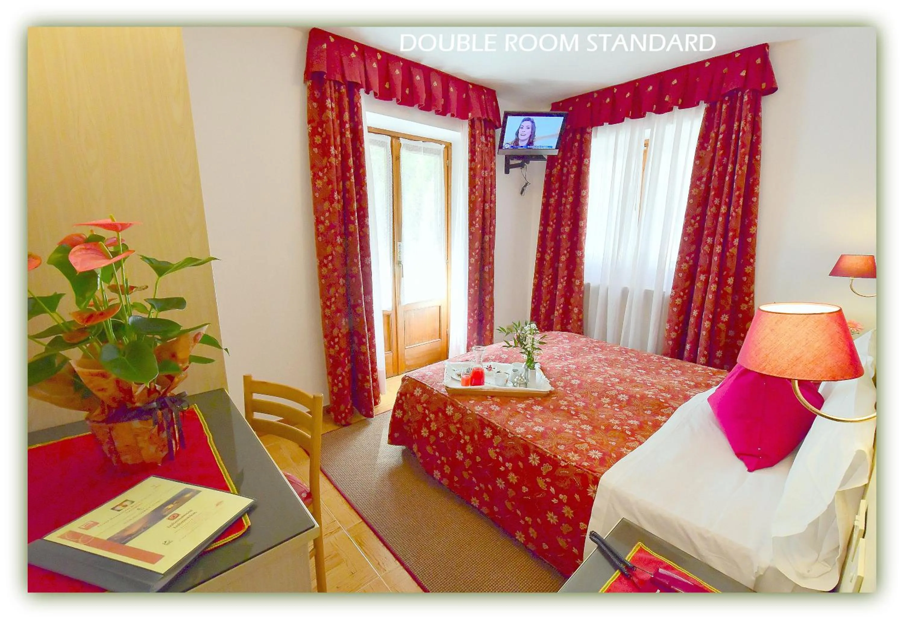 Bed in Hotel Beau Sejour