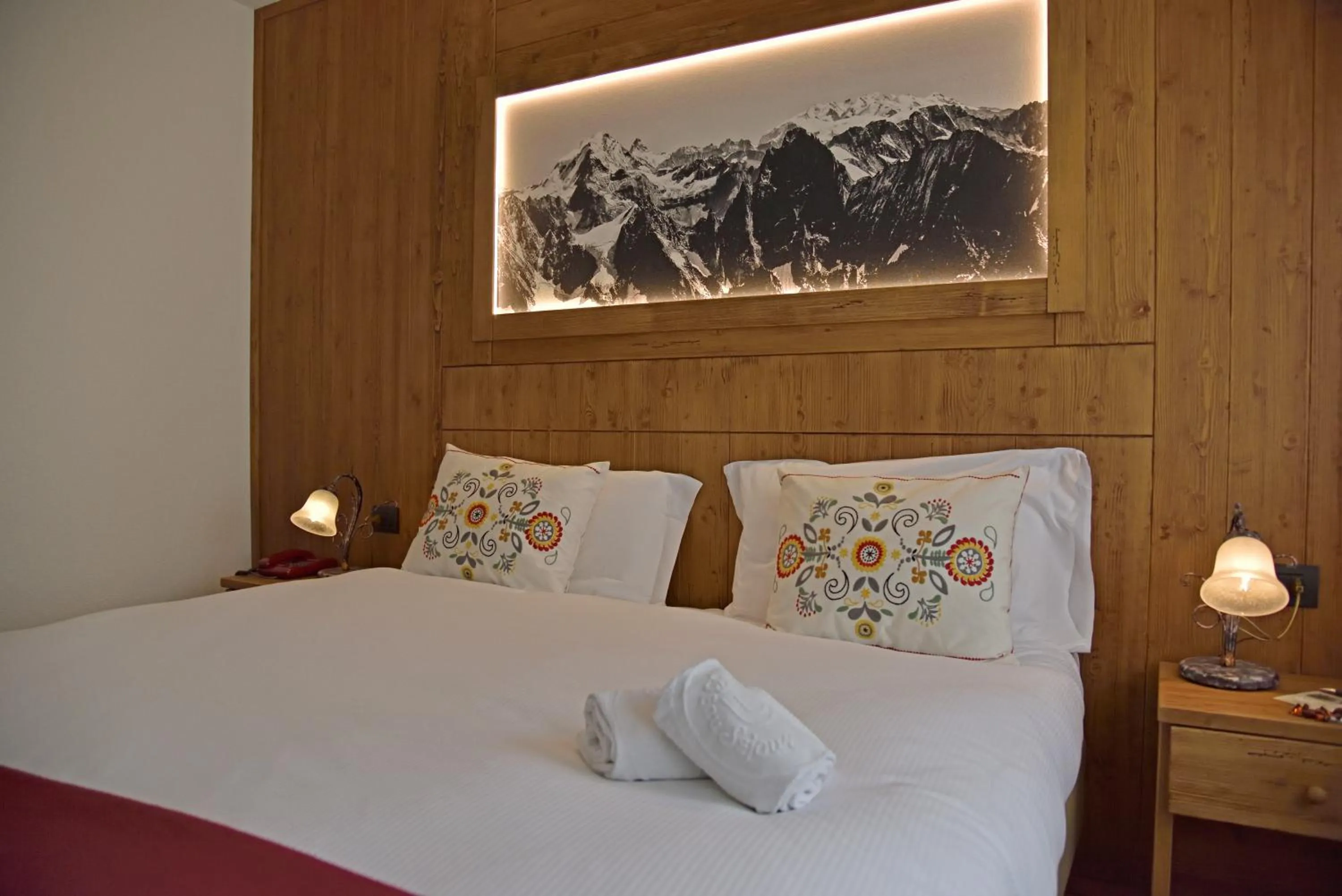 Bed in Hotel Beau Sejour