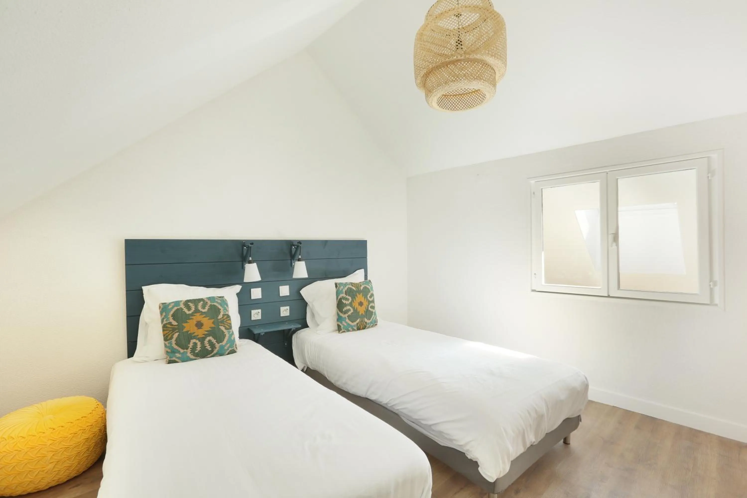Bed in Les Lilas Serviced Apartments
