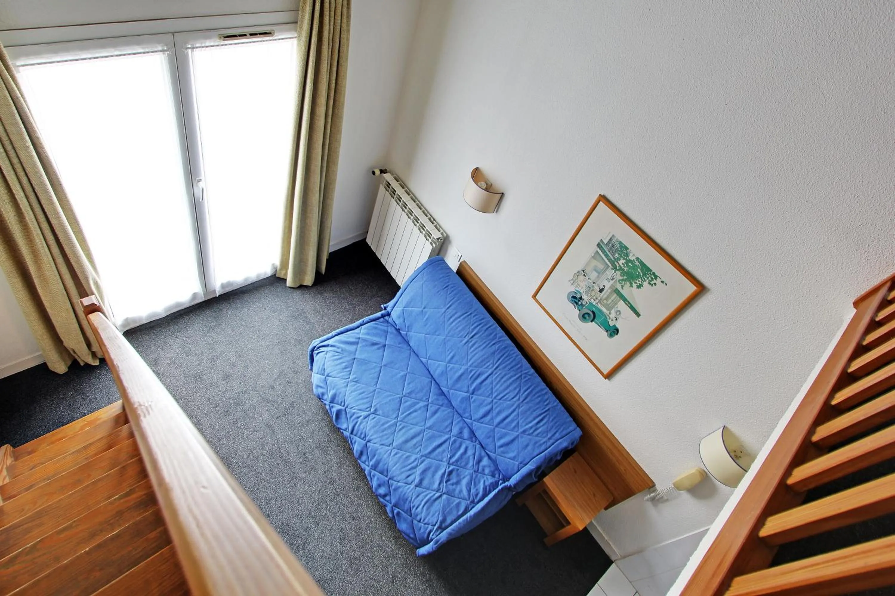 Seating area, Bed in Les Lilas Serviced Apartments