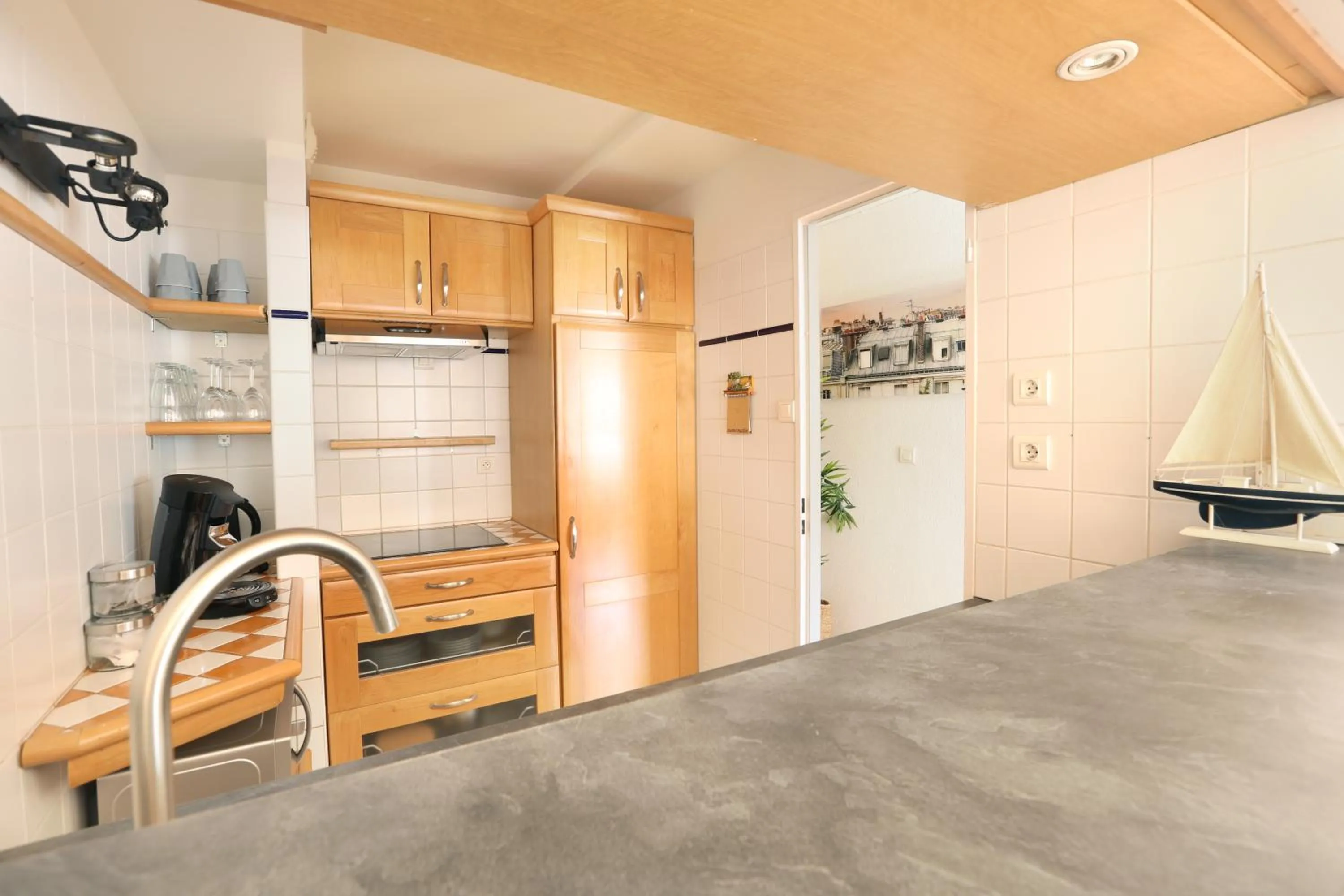 Kitchen or kitchenette in Les Lilas Serviced Apartments