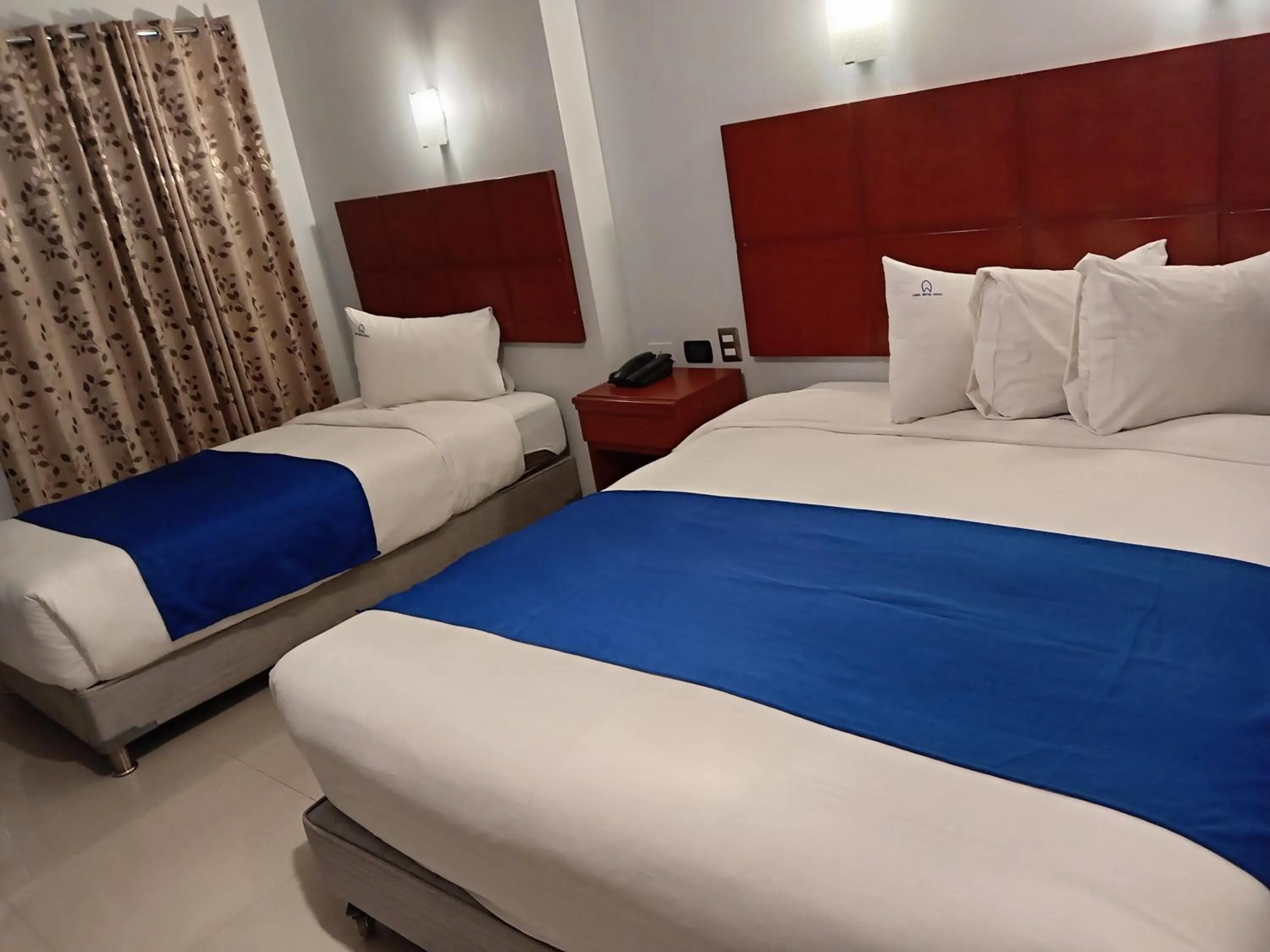 Bed in Aqua Hotel Cusco