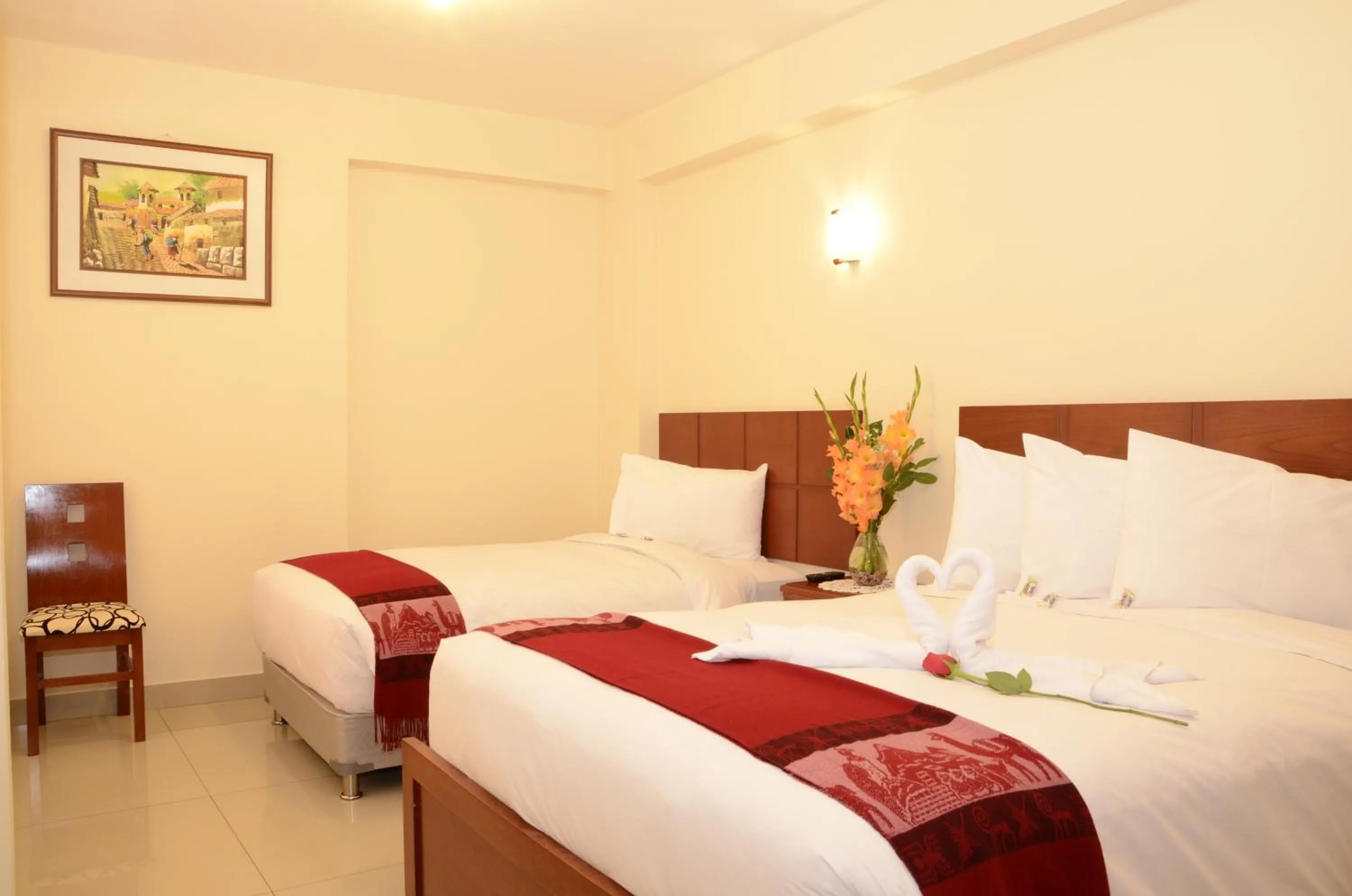 Bed in Aqua Hotel Cusco