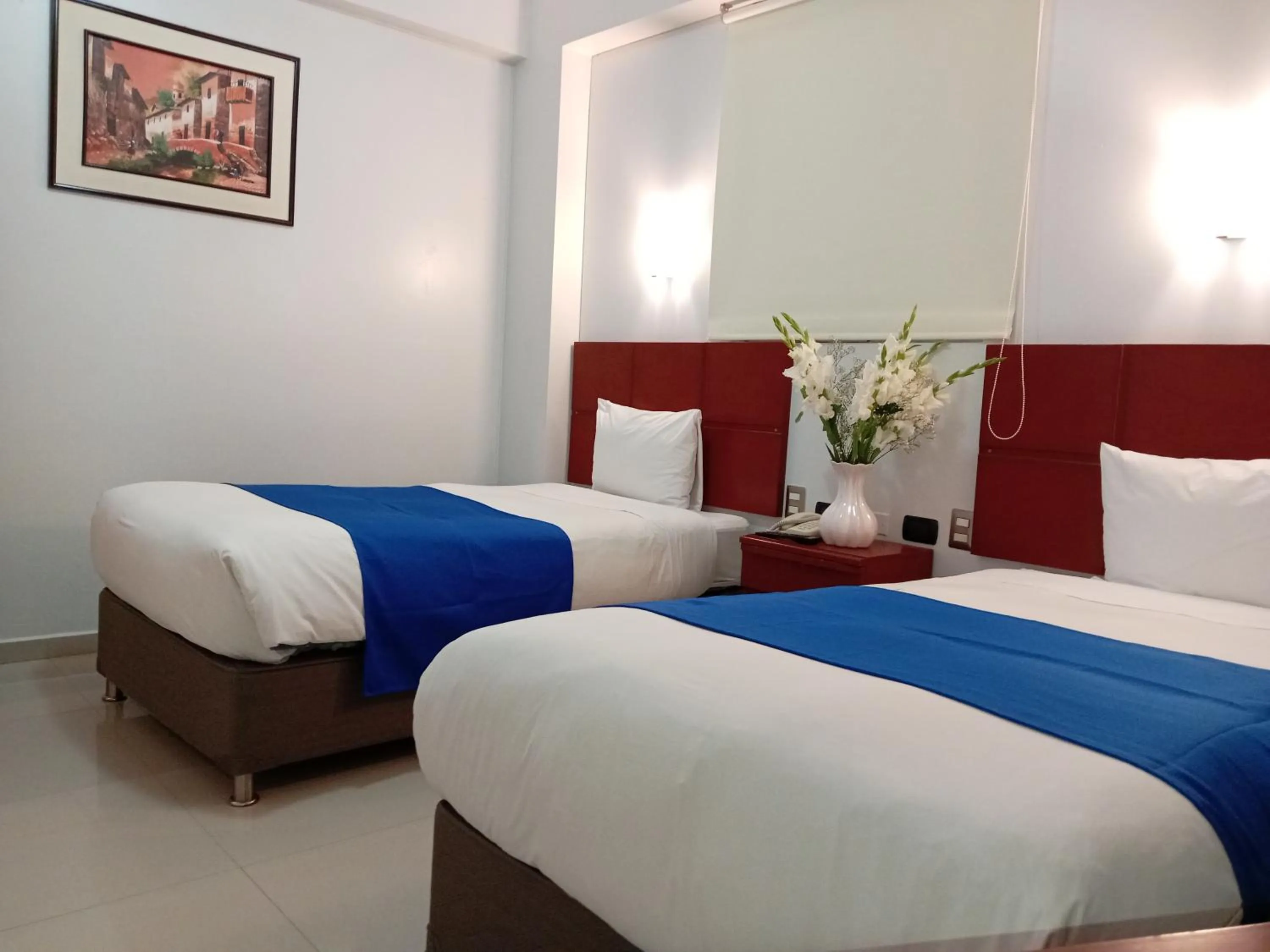 Bed in Aqua Hotel Cusco