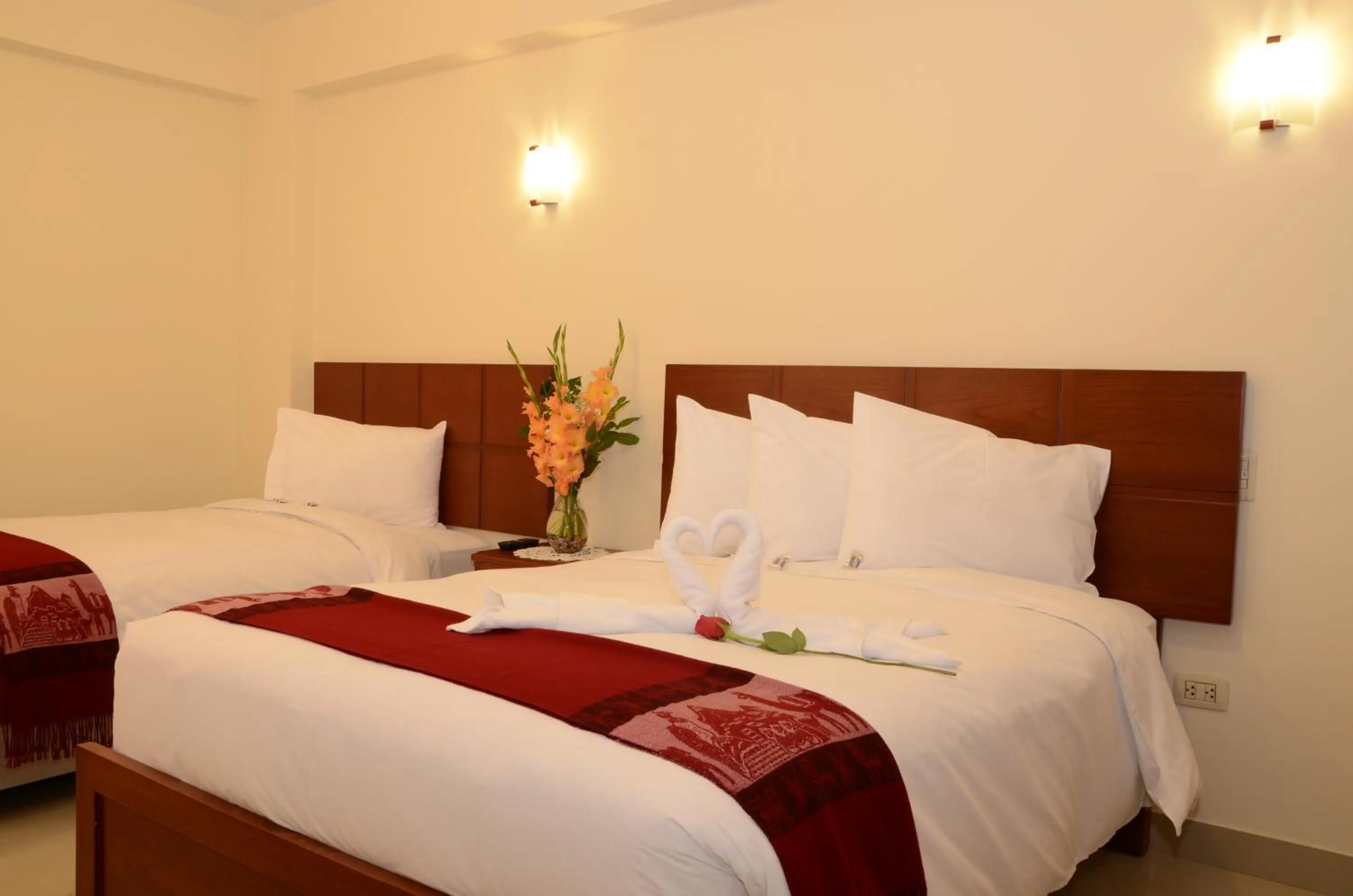 Bed in Aqua Hotel Cusco