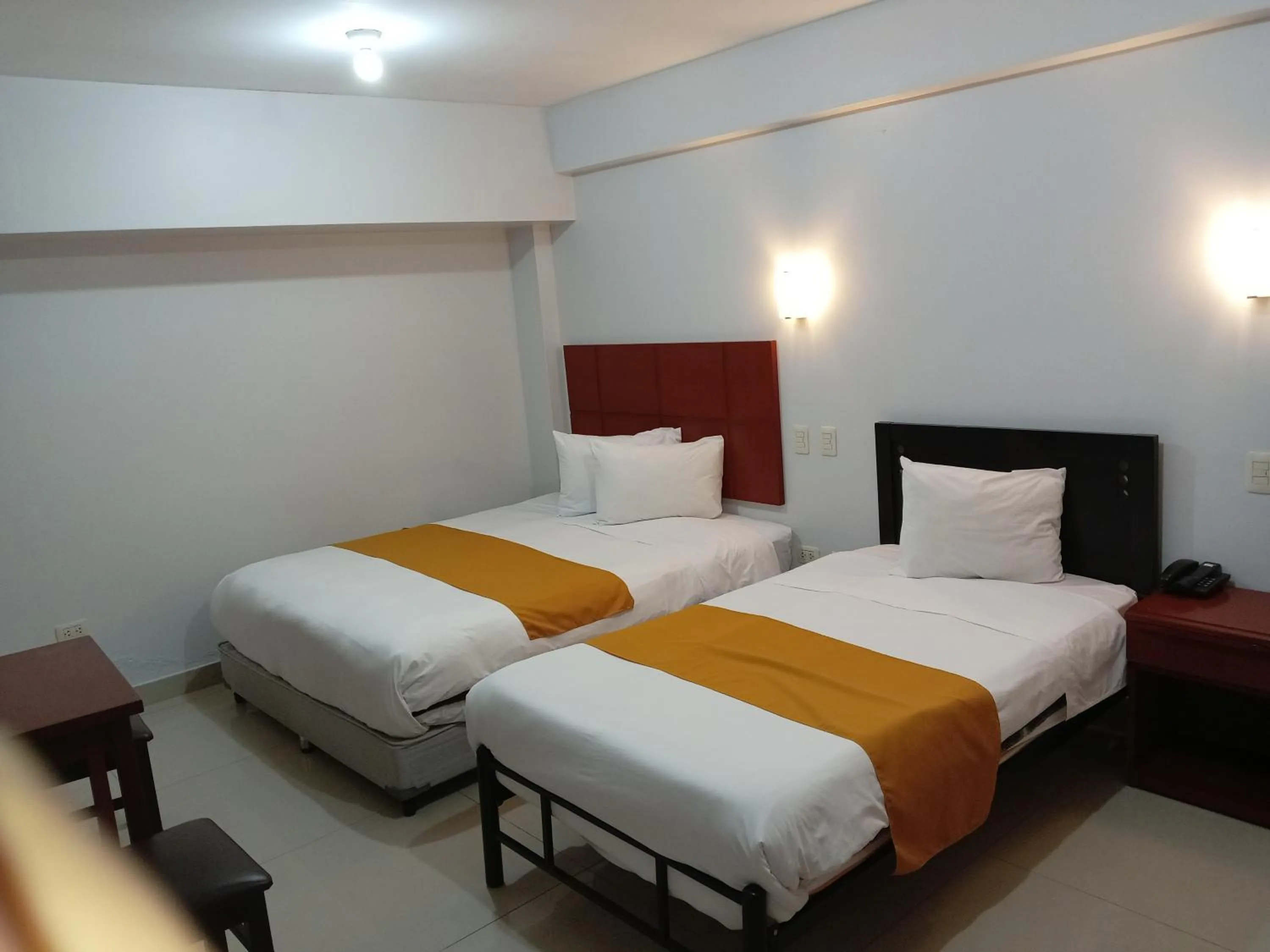 Bed in Aqua Hotel Cusco