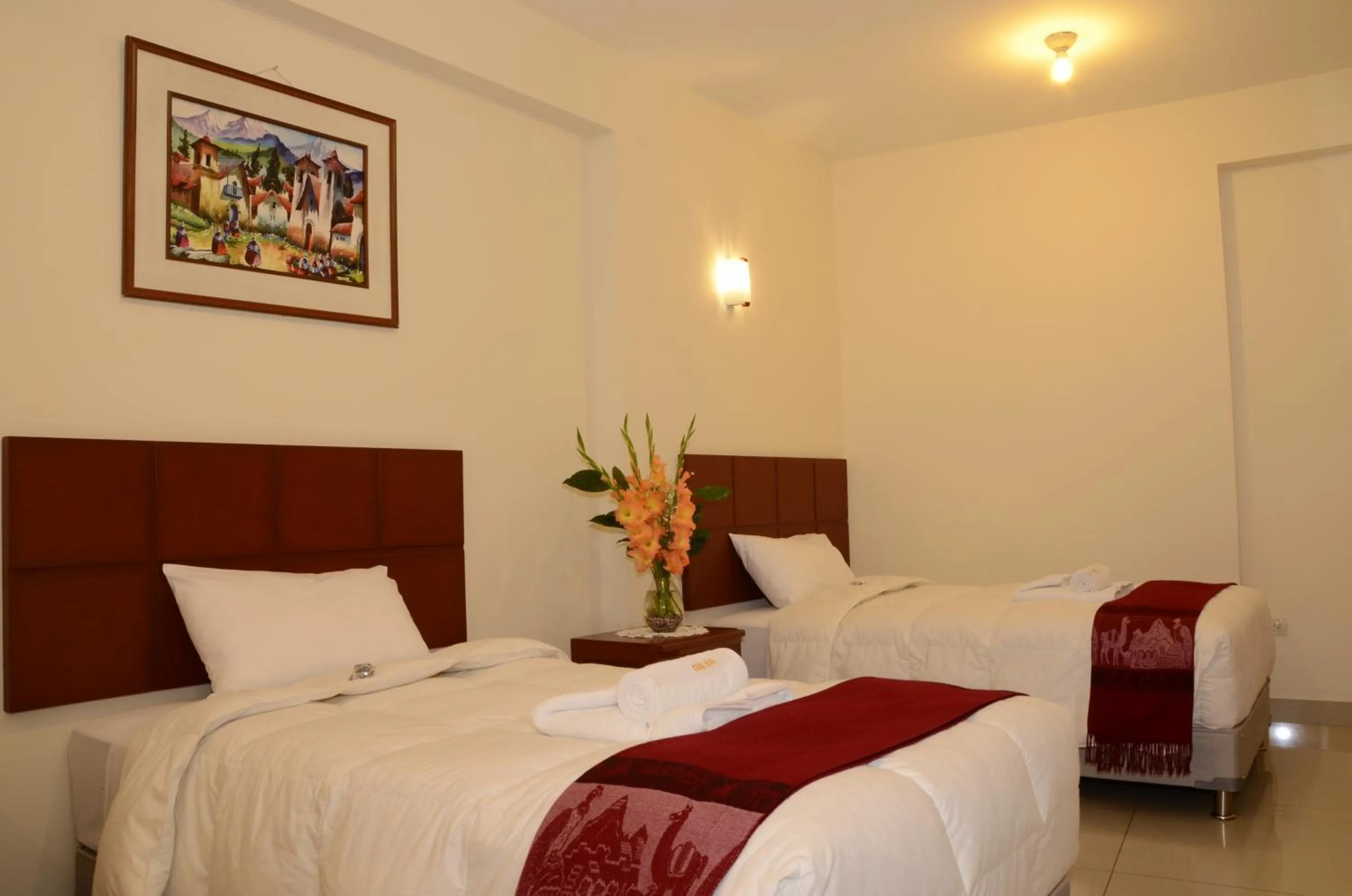 Bed in Aqua Hotel Cusco