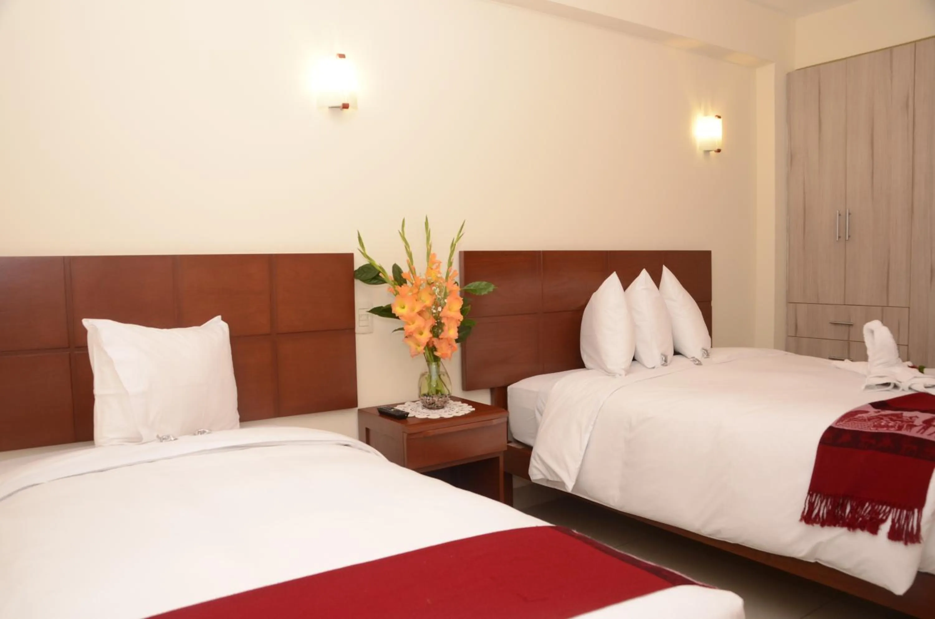 Bed in Aqua Hotel Cusco