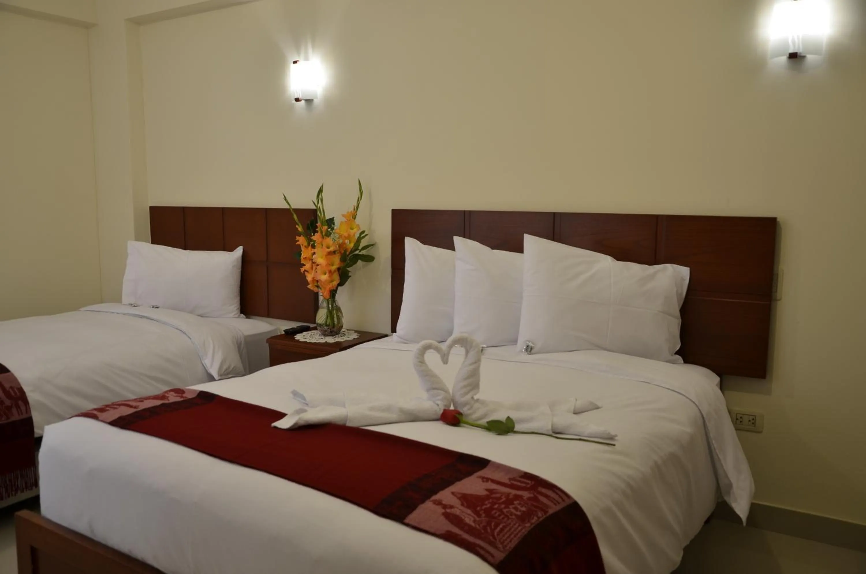 Bed in Aqua Hotel Cusco