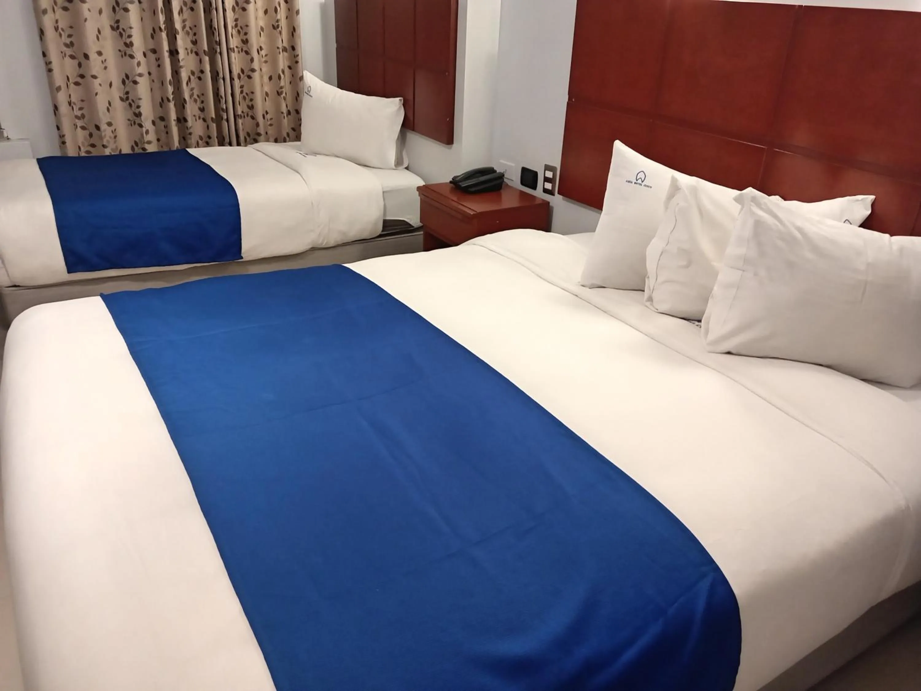 Bed in Aqua Hotel Cusco