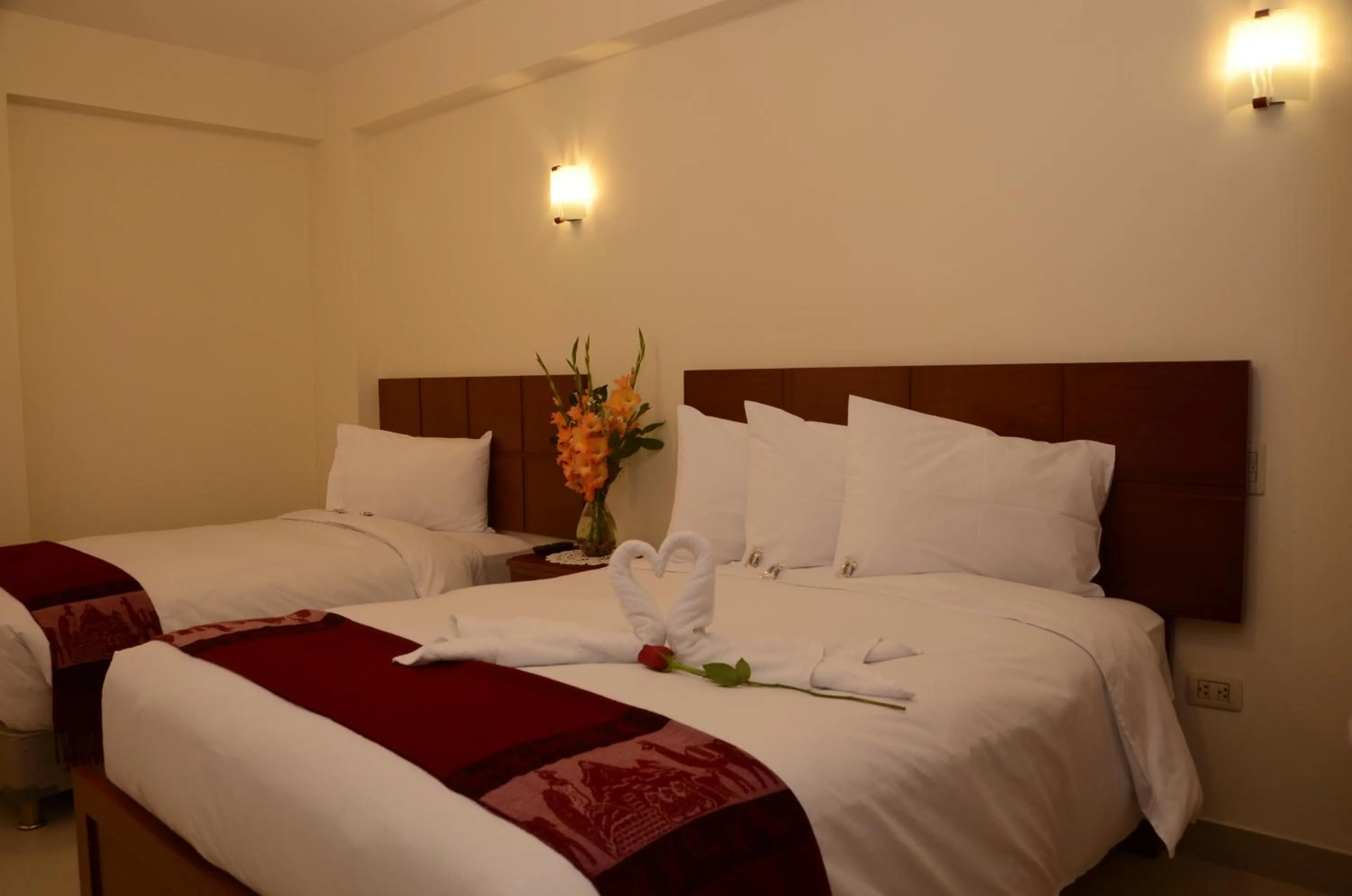 Bed in Aqua Hotel Cusco