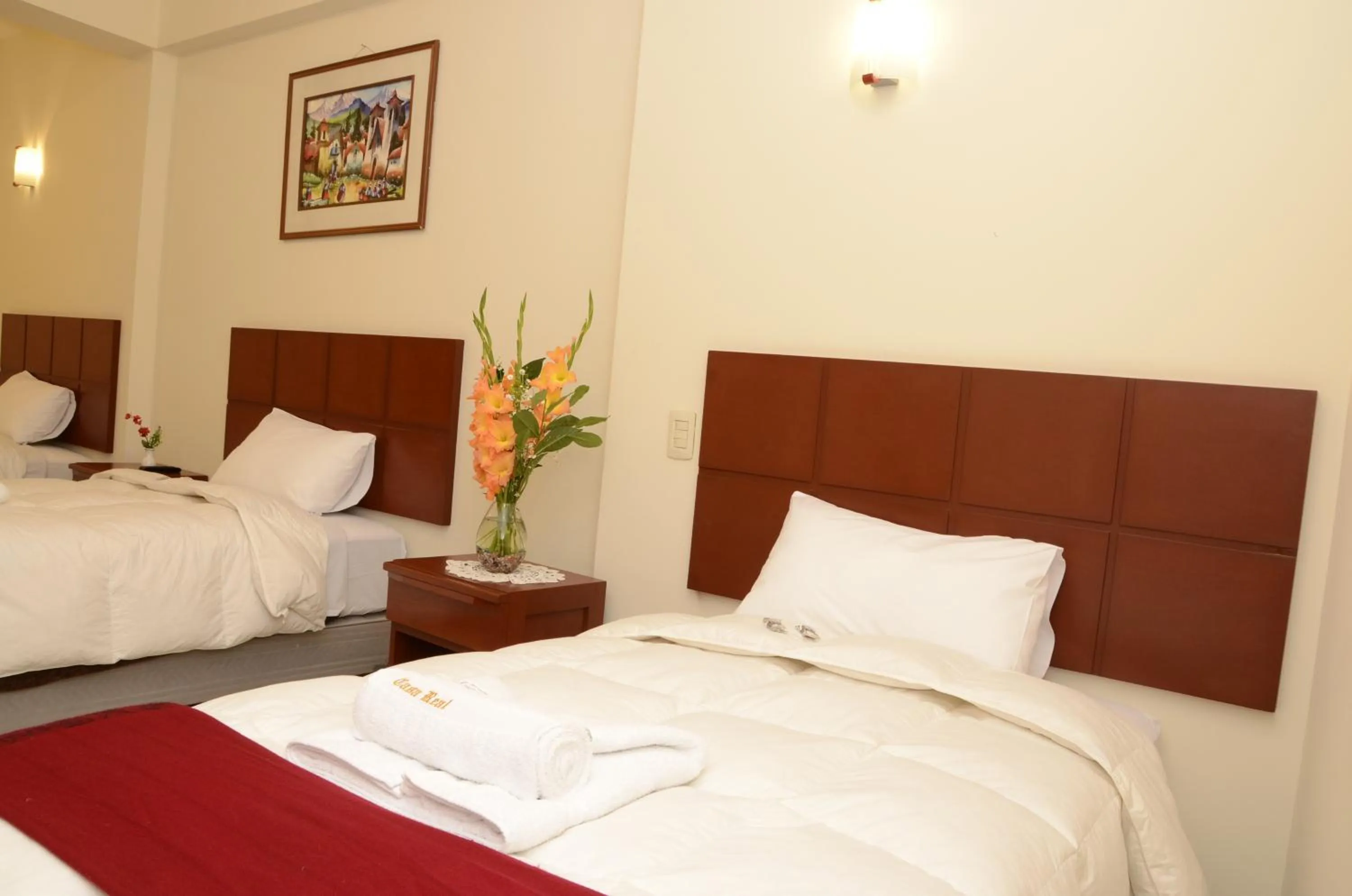 Bed in Aqua Hotel Cusco