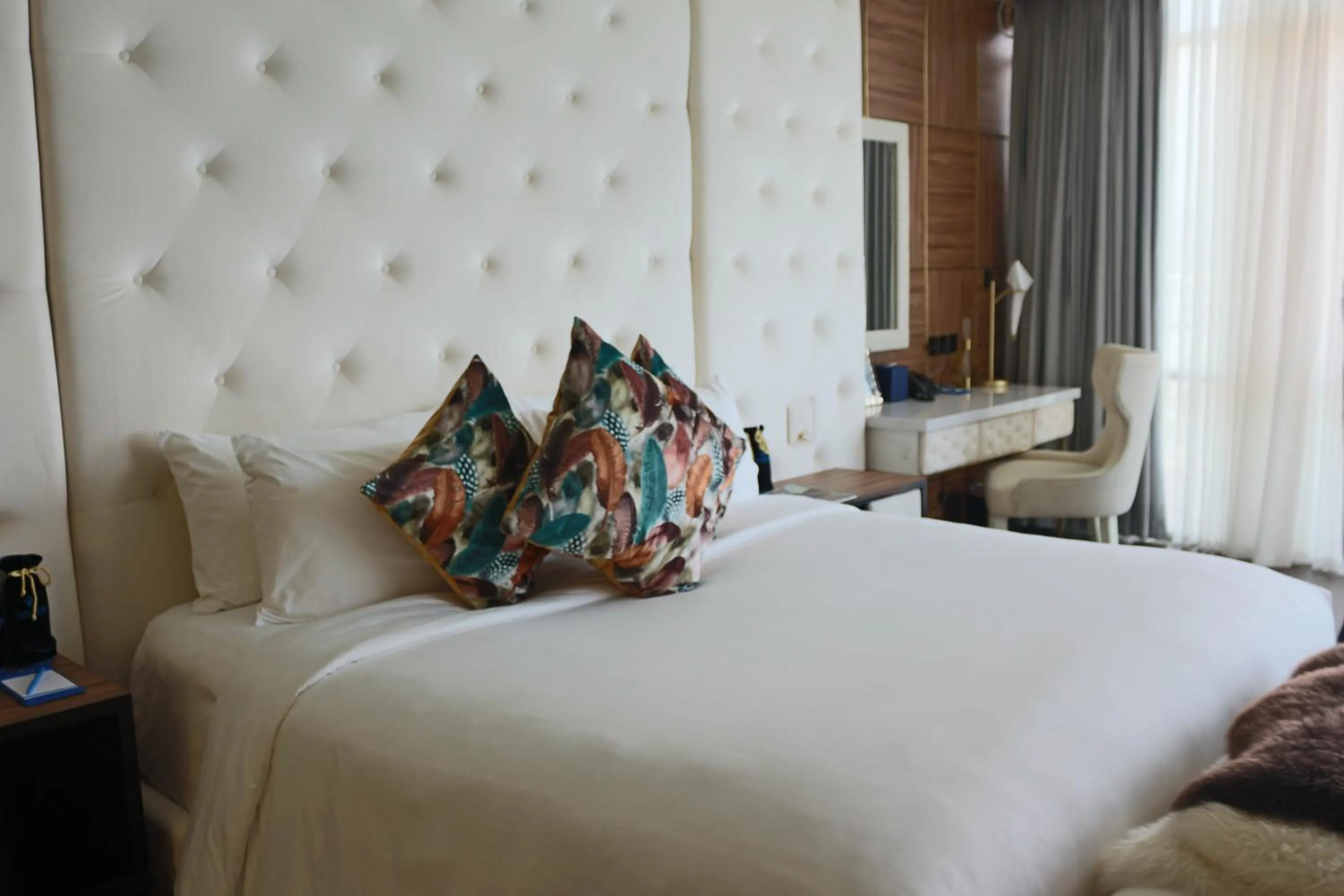 Bed in Diamond Bay Hotel