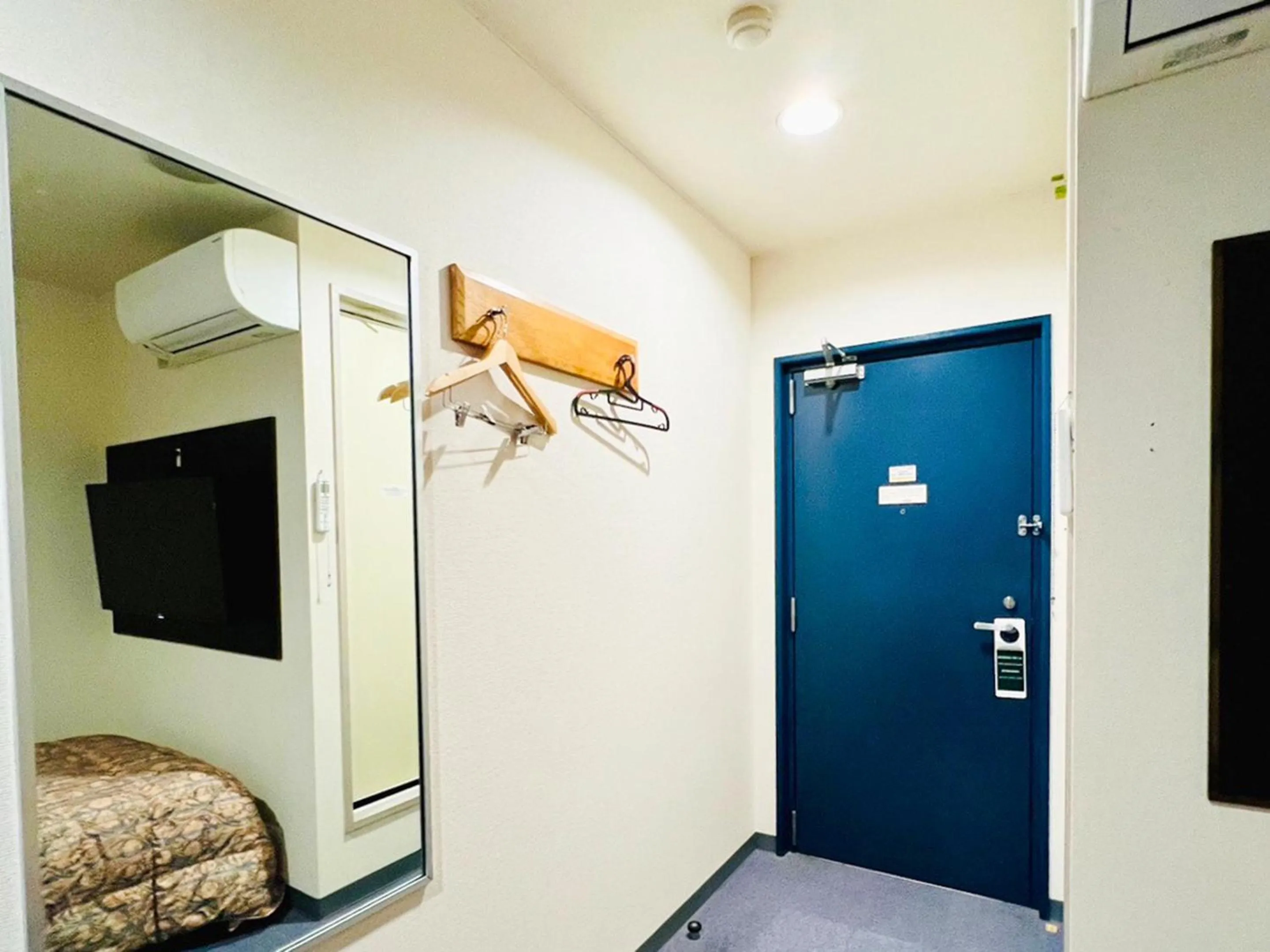 Photo of the whole room, Bed in Station Business Hotel Tenshukaku
