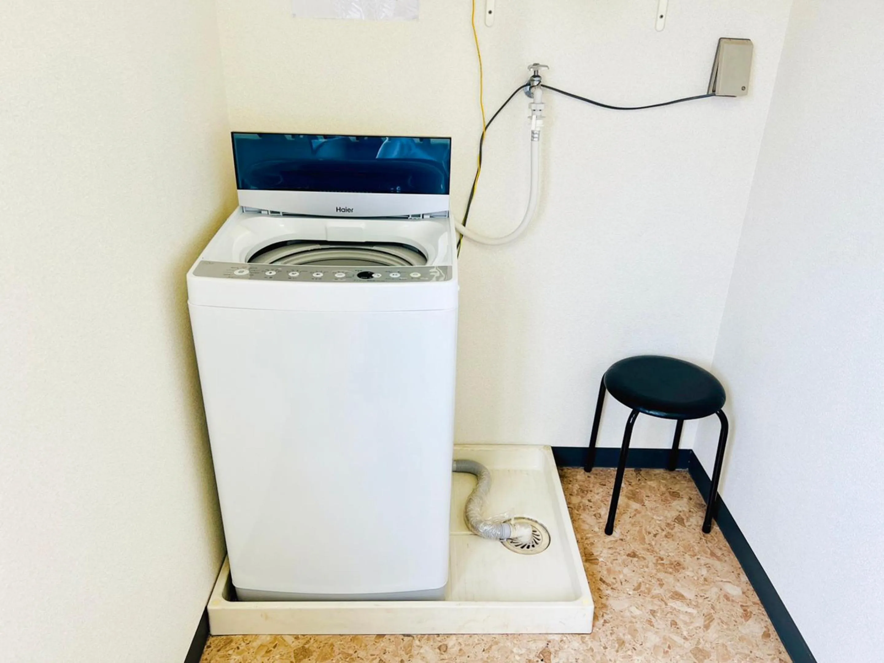 washing machine in Station Business Hotel Tenshukaku