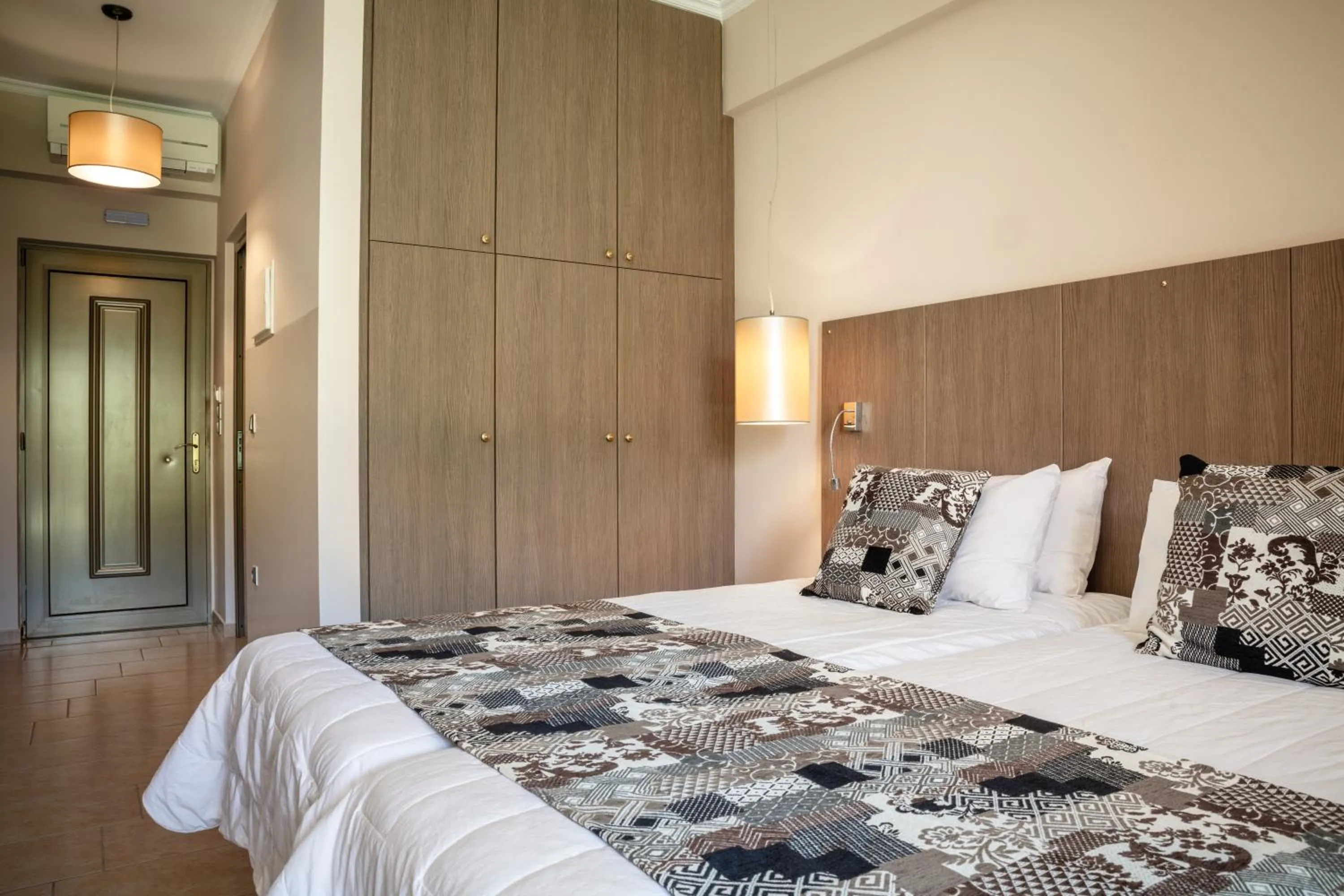 Bed in Royalty Suites Seaside