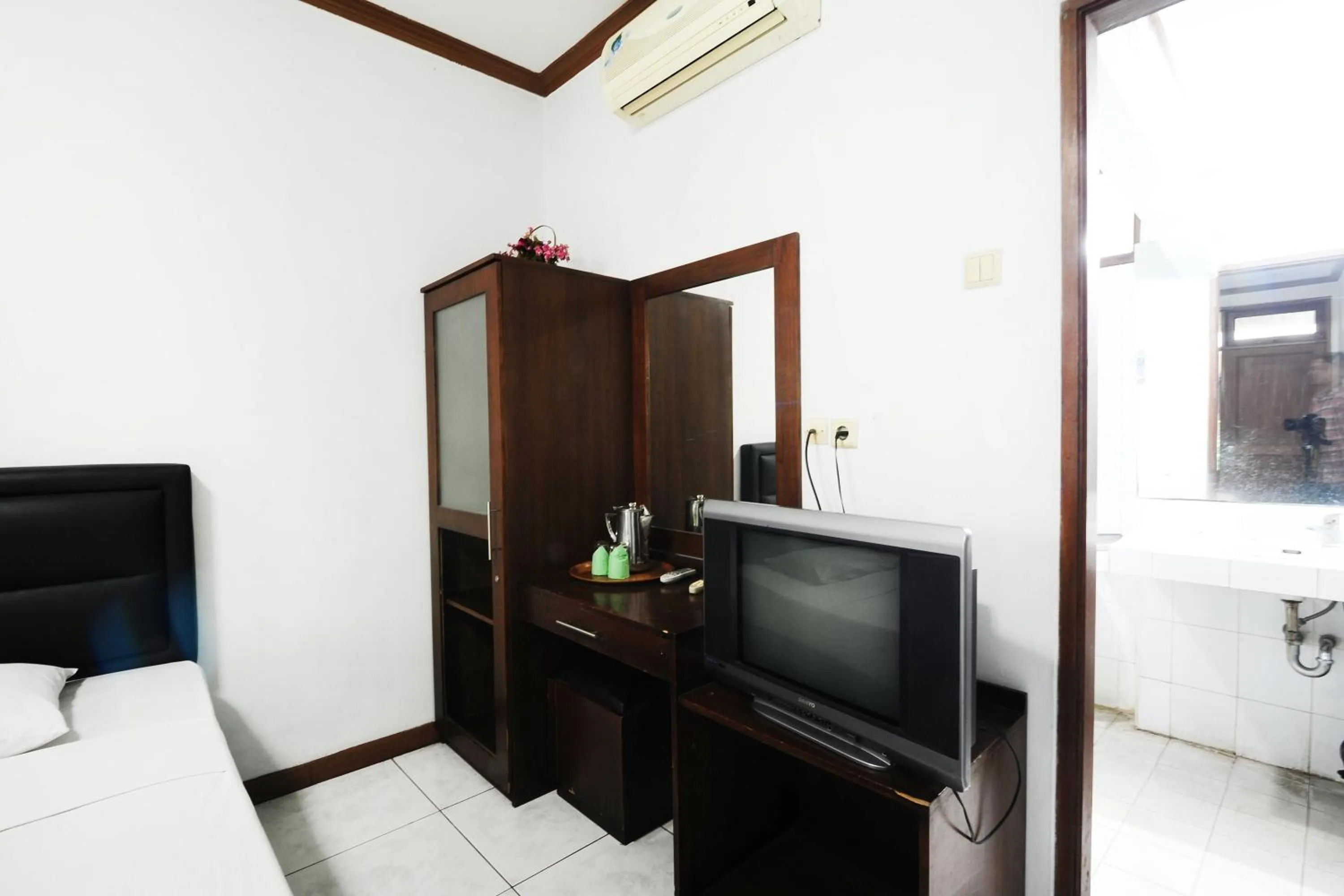 Bedroom in De'Qur Hotel Bandung