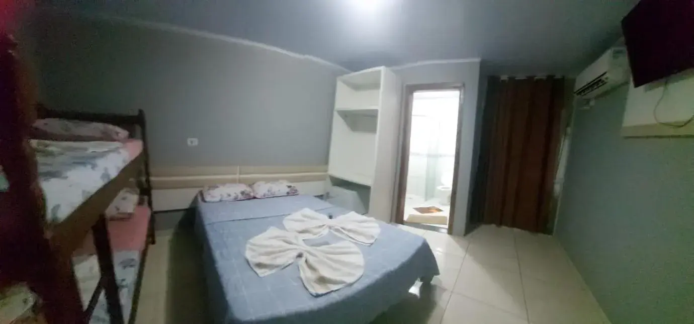 Standard Quadruple Room in Pousada Ilha do Itacolomi Com Piscina Proximo do Beto Carrero Standard Quadruple Room in Pousada Ilha do Itacolomi Com Piscina Proximo do Beto Carrero