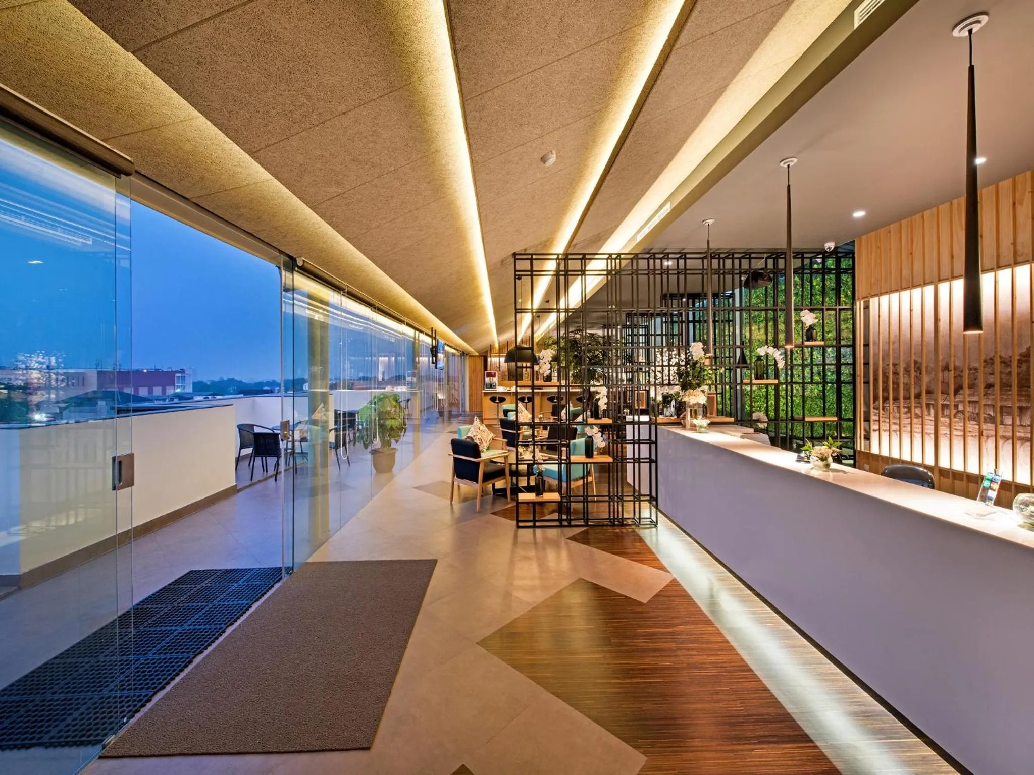 Communal lounge/ TV room in Tama Boutique Hotel